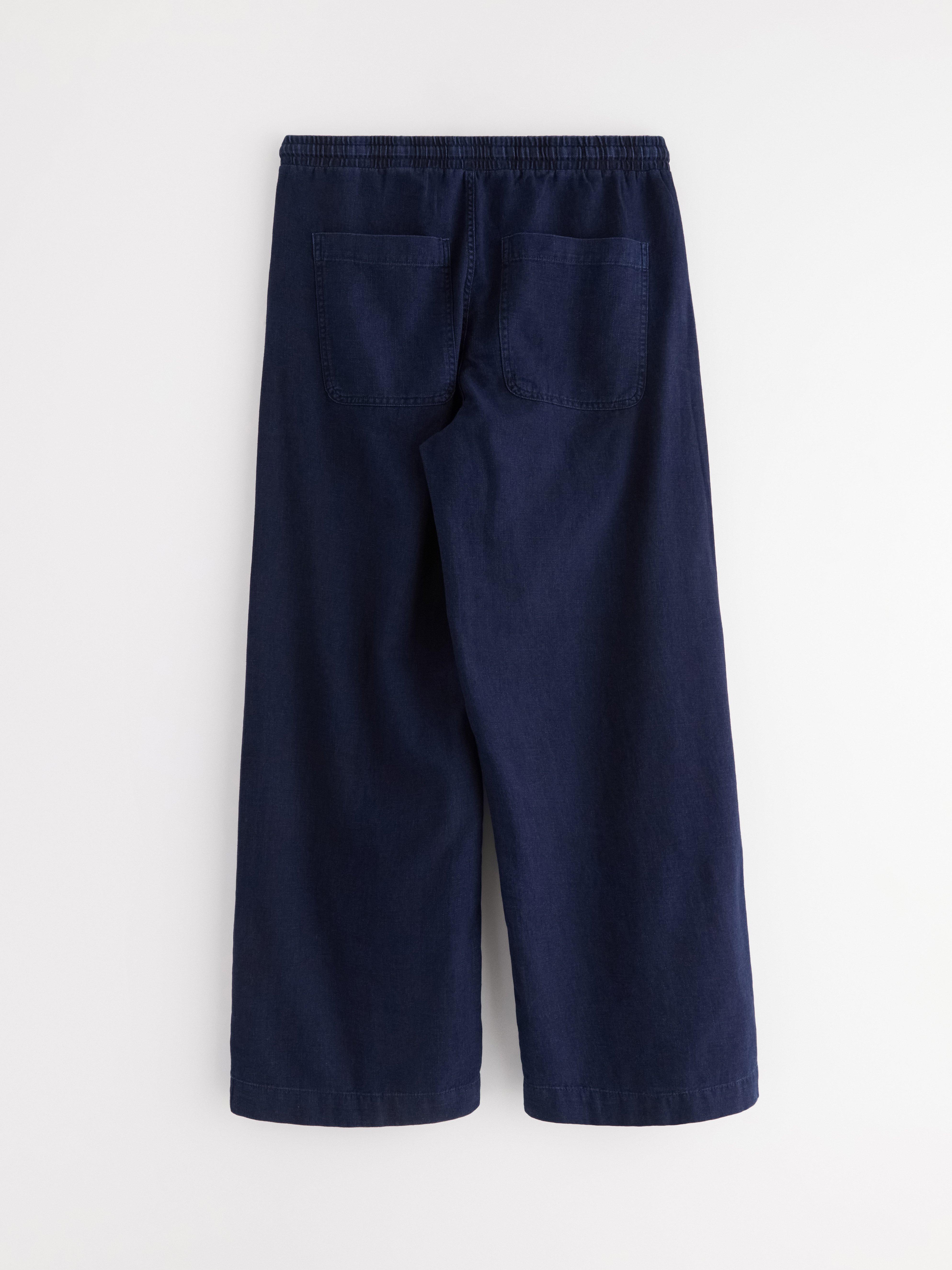 Pantalones vaqueros con cordón ajustable, color azul vaquero.