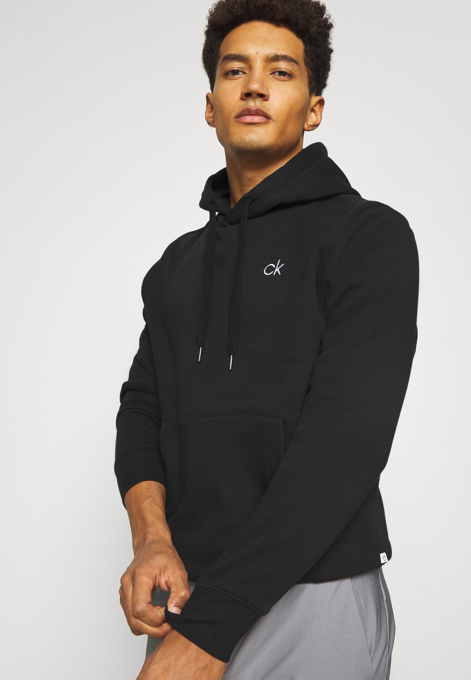 Felpa con cappuccio Calvin Klein Golf PLANET - nera