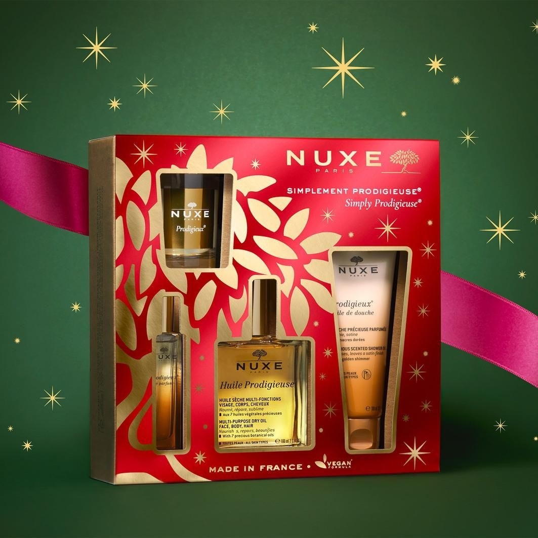NUXE ķermeņa kopšanas komplekts Nuxe Prodigieux® dāvanu komplekts - Prodigieux® dušas eļļa 100 ml + Huile Prodigieuse® 100 ml + Prodigieux® Le Parfum 15 ml + svece Prodigieuse® 70 g 1 gab.