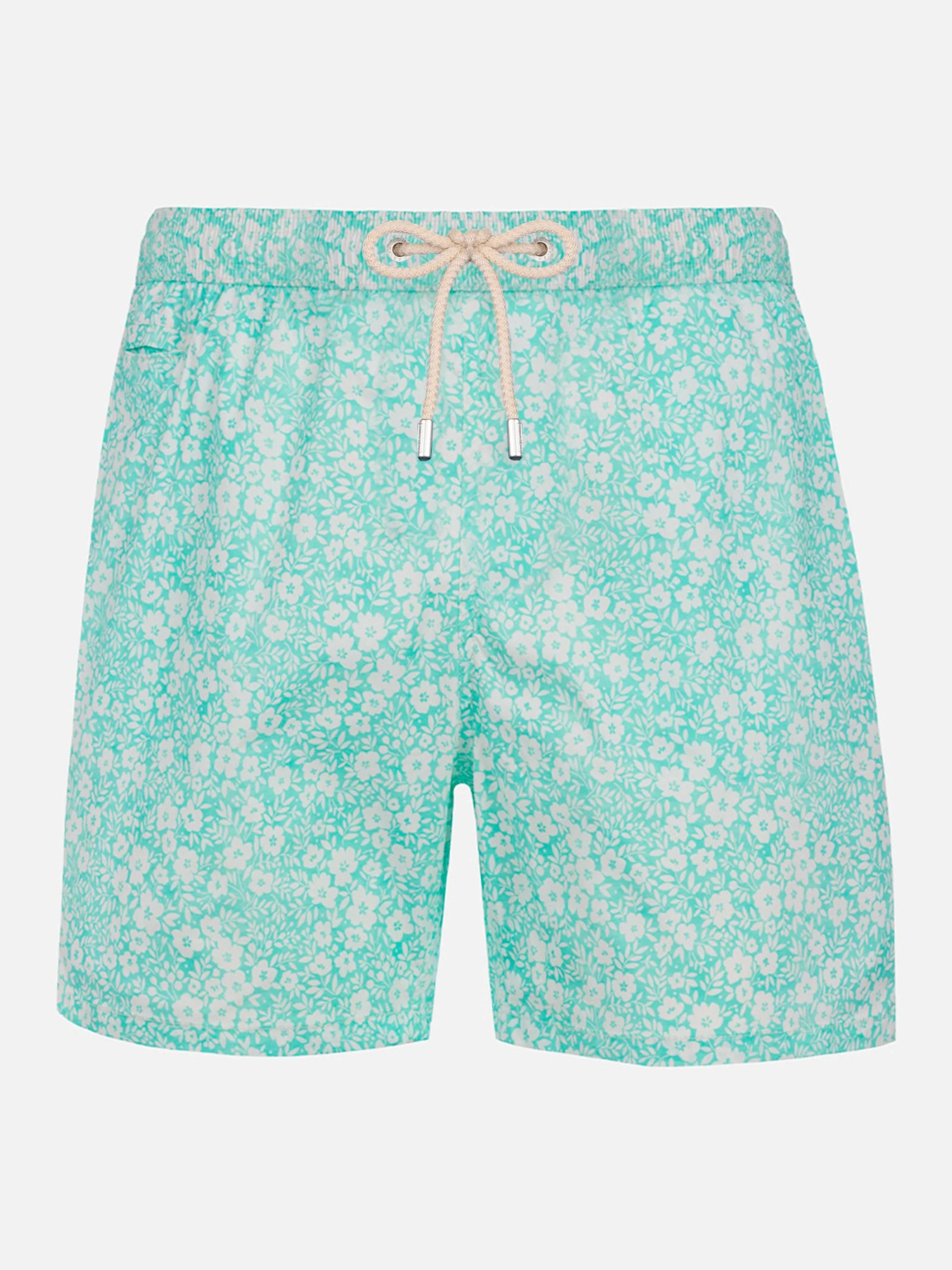 Klassiek comfortabel, licht elastisch badpak met bloemenprint.