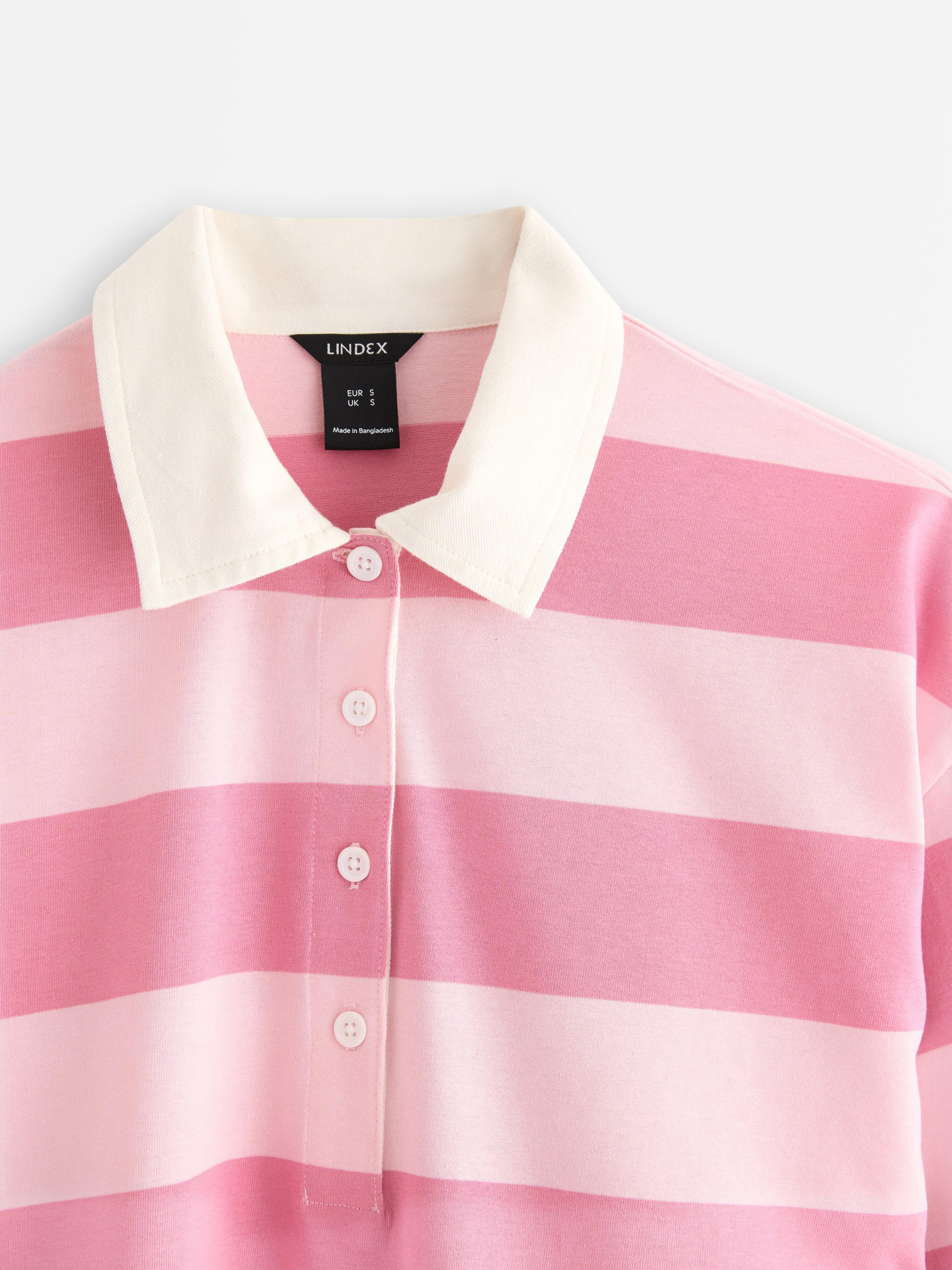 Camiseta de rugby de manga corta, color rosa claro.