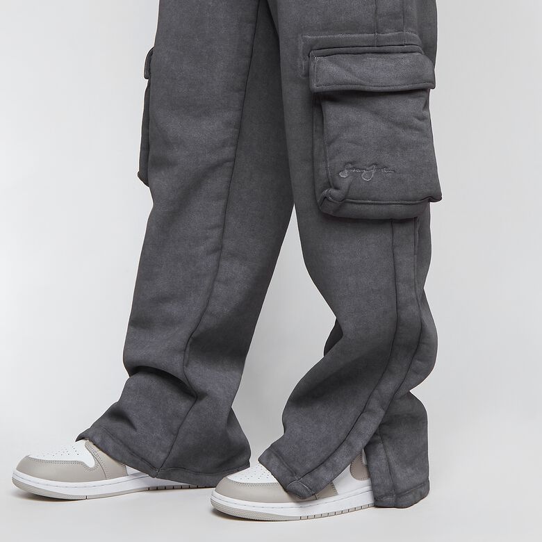 Pantalones deportivos con abertura y logo descolorido