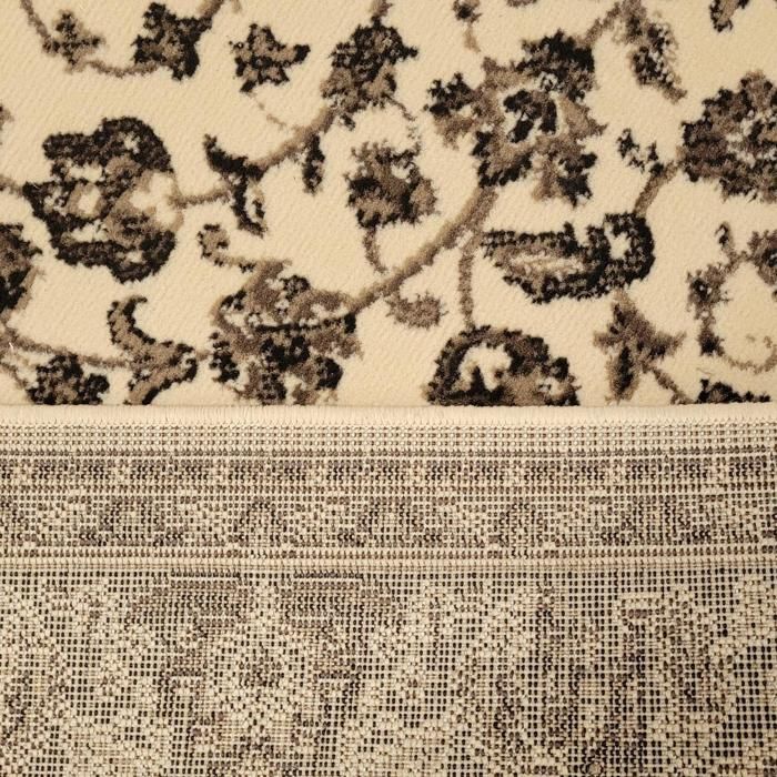 Tapis oriental 140x200 rectangle ivoire tissé motif ancestral LYN1 NOMED