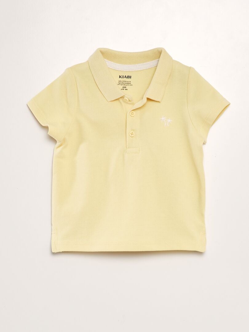 Camisa polo de algodão piqué com estampa de palmeiras - AMARELA