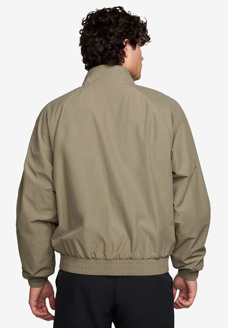 Veste d'entraînement Nike Performance COURT HERITAGE - Vert olive neutre/sapin