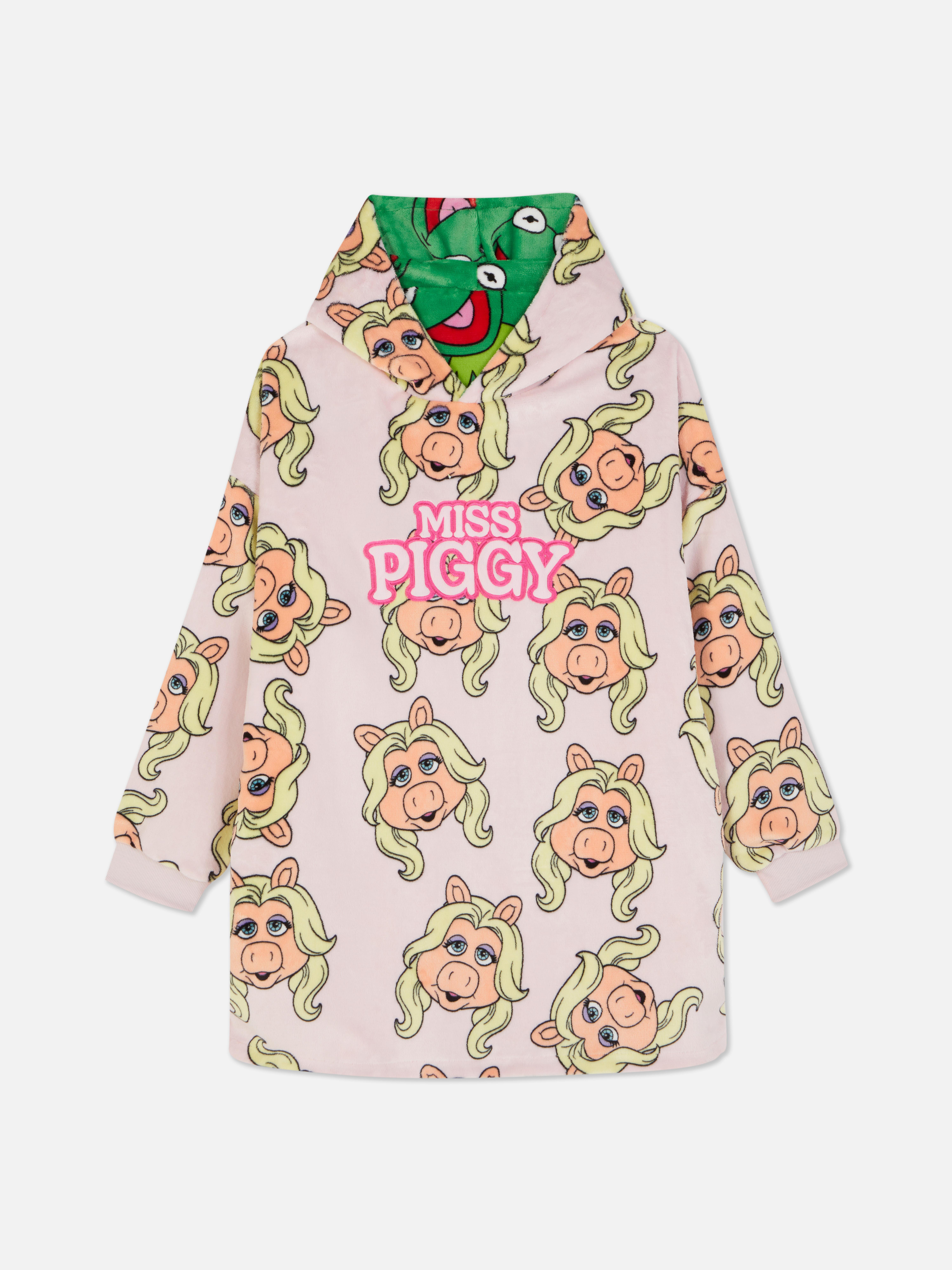 Snuddie reversibil cu Muppets. Un snuddie moale cu un model cu Muppets pe ambele părți.