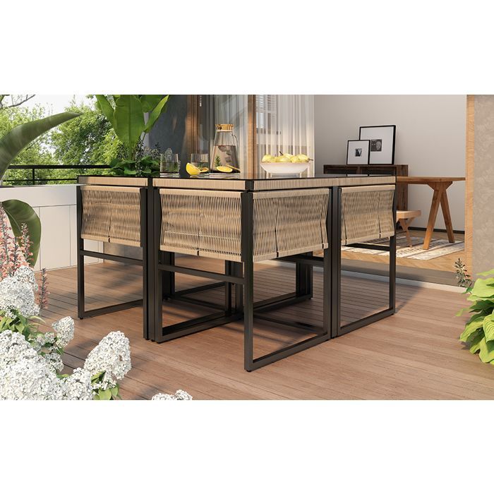 Conjunto de comedor de jardín de 5 piezas: mesa de 110x110x74 cm y sillas apilables.