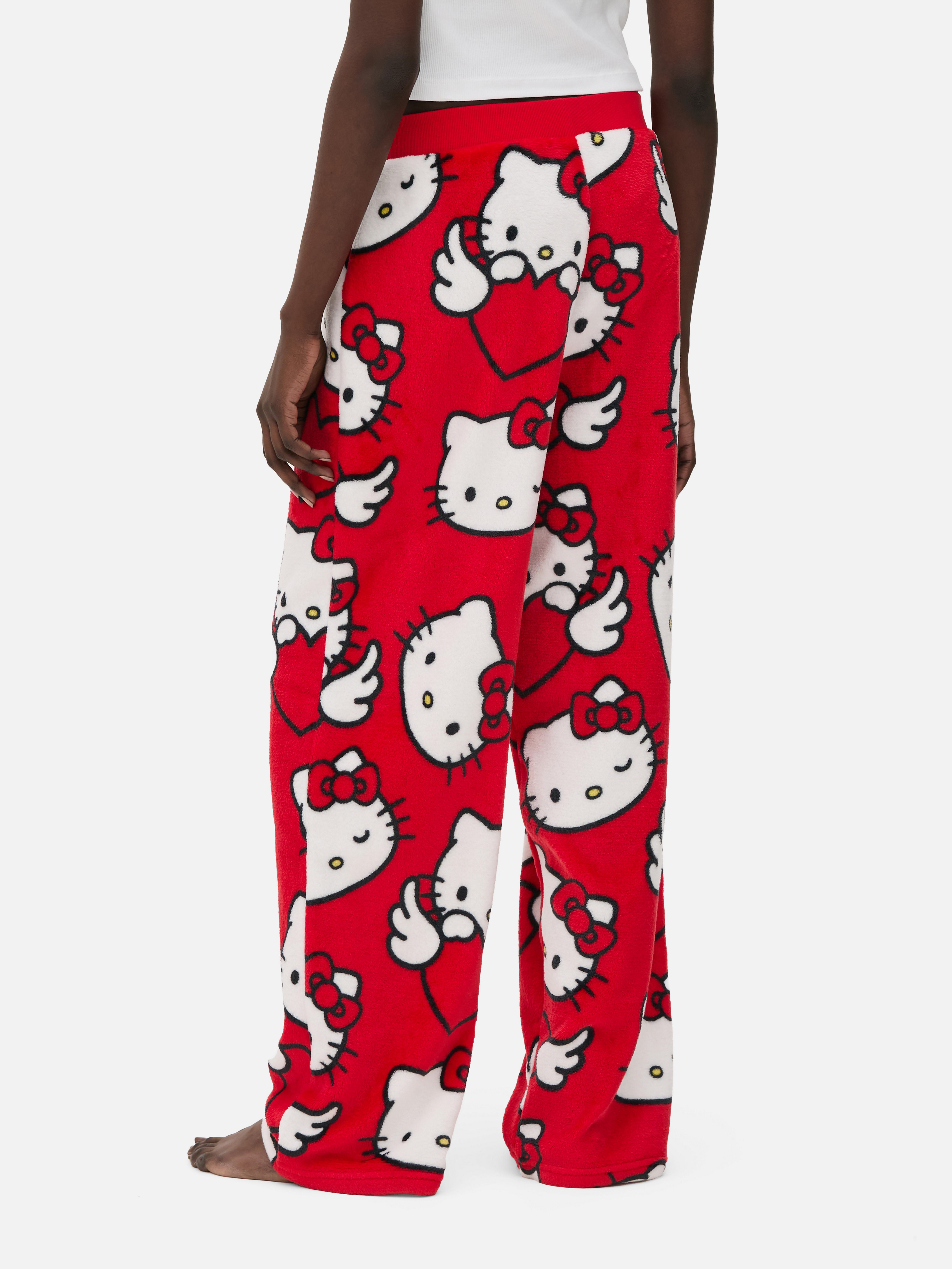 Pantaloni de pijama din fleece Hello Kitty Pantaloni de pijama din fleece cu design Hello Kitty