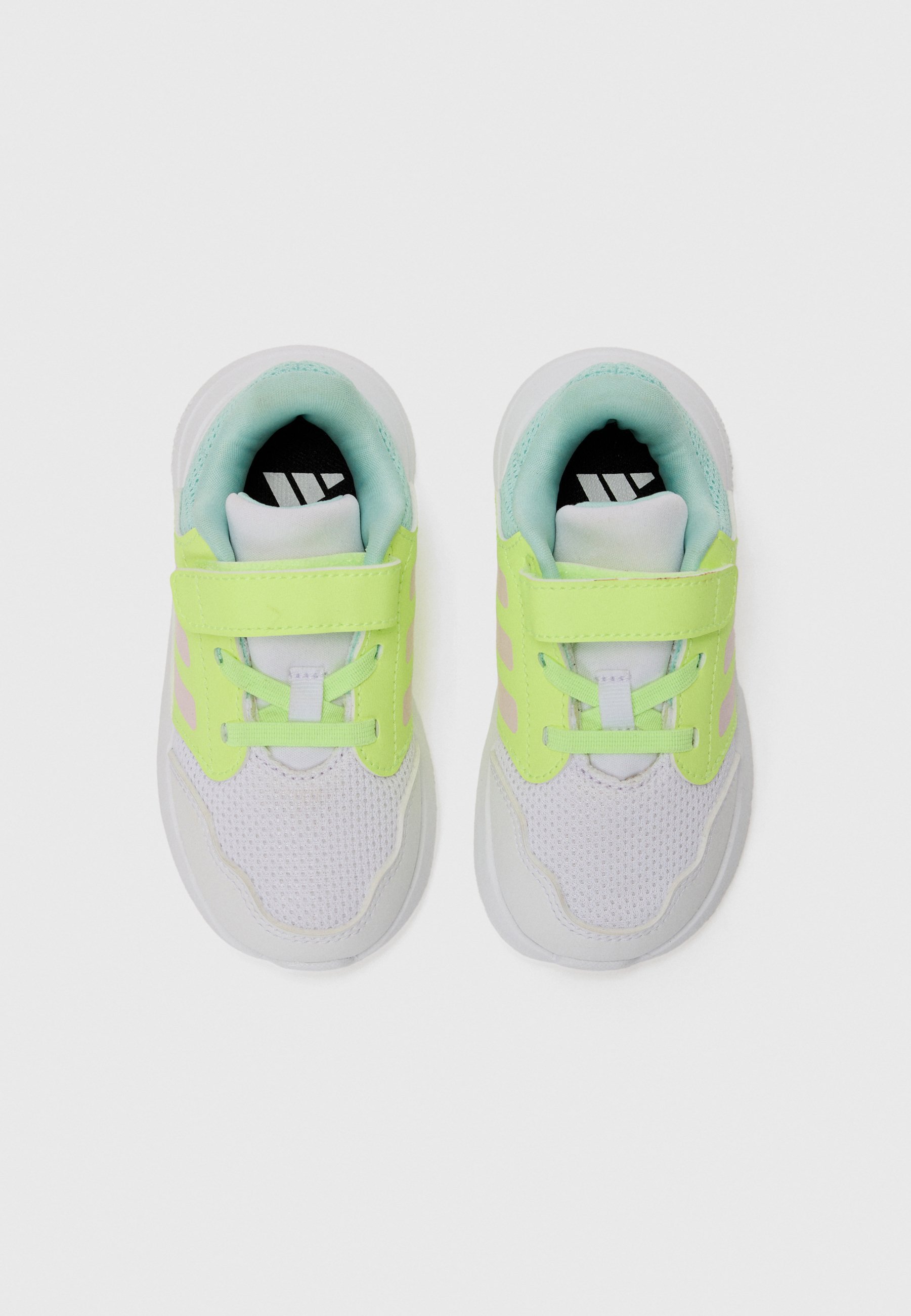 adidas Performance TENSAUR UNISEX - Chaussures de running sur route - blanc/rose transparent/jaune
