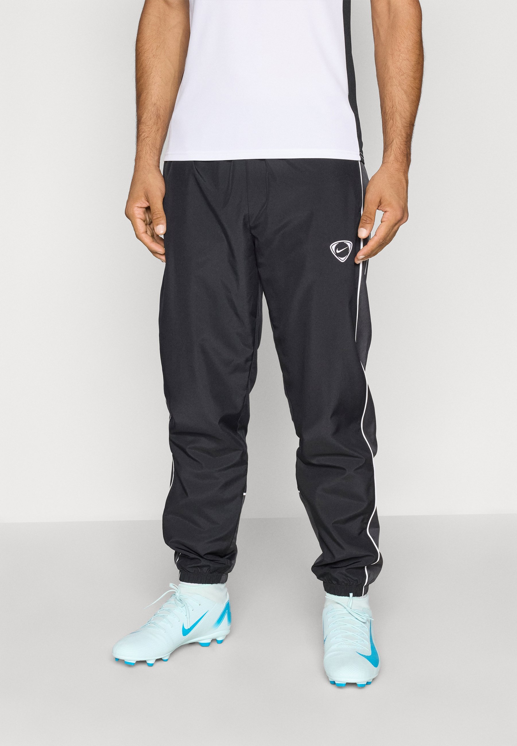 Teplákové kalhoty Nike Performance - černá/antracit/bílá