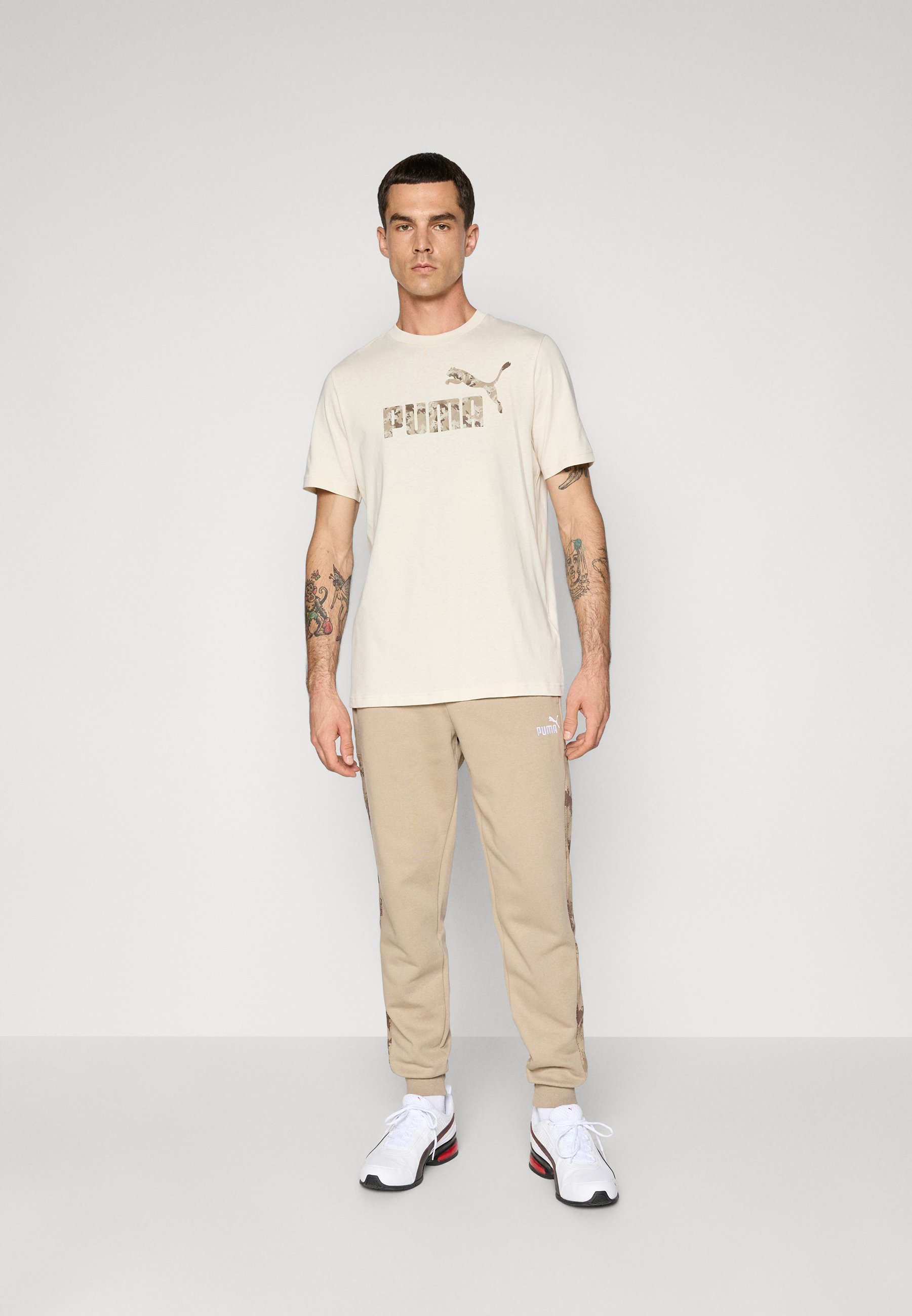 Pantalon de survêtement Puma CAMO - café glacé