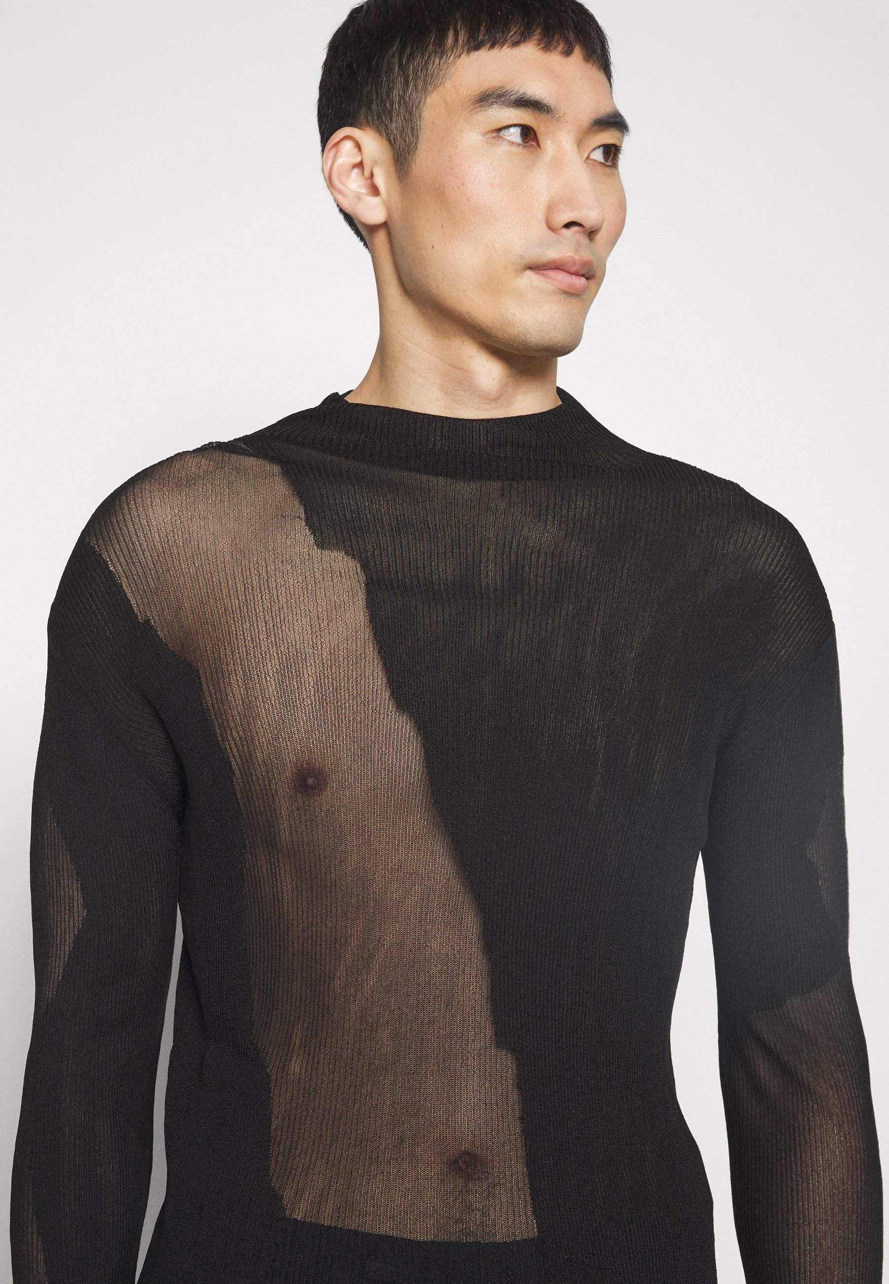 Pull à col roulé transparent 032c - noir