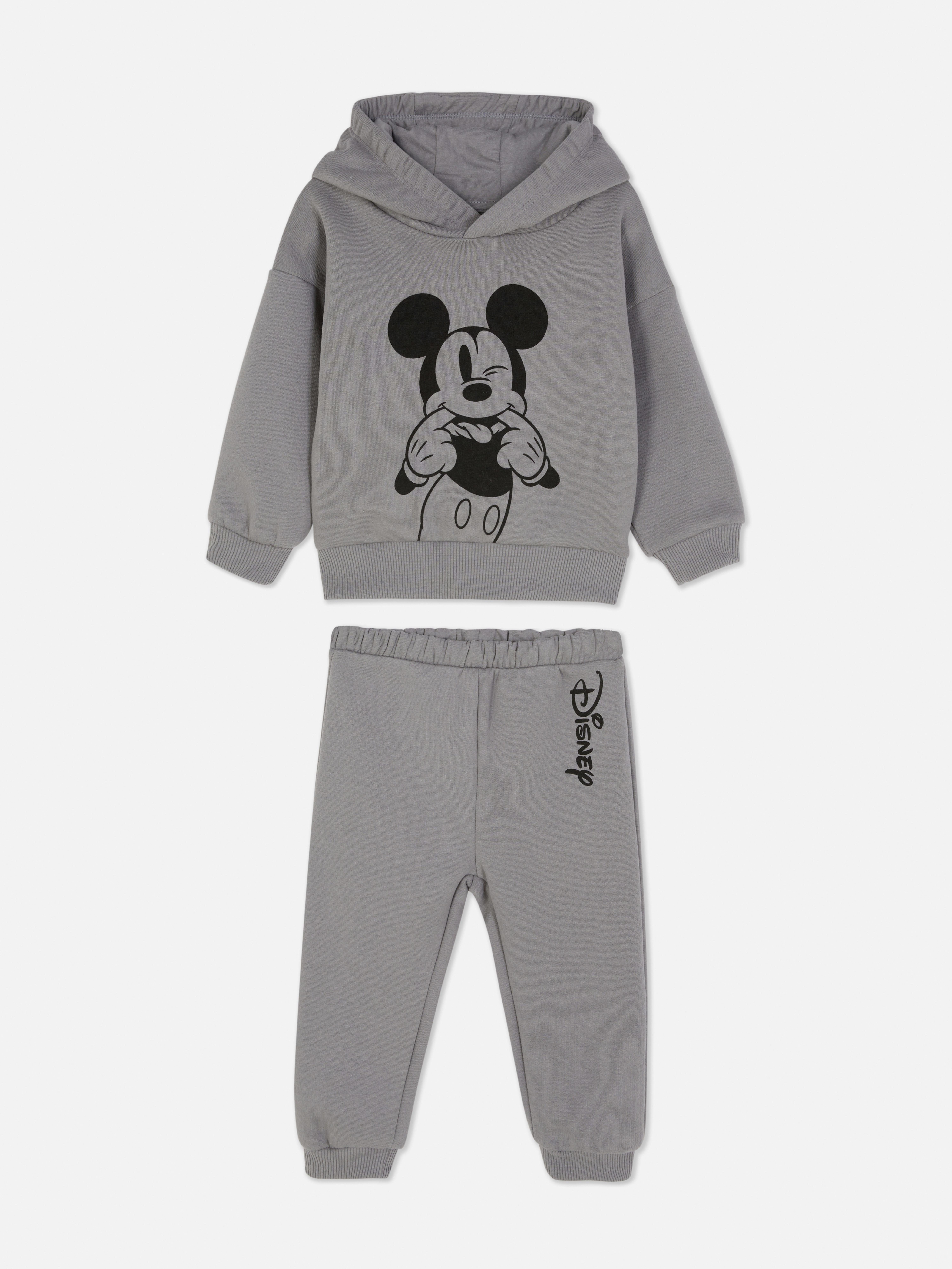 Hanorac și pantaloni de trening Disney Mickey Mouse O ținută din două piese, cu hanorac Disney Mickey Mouse și pantaloni de trening asortați
