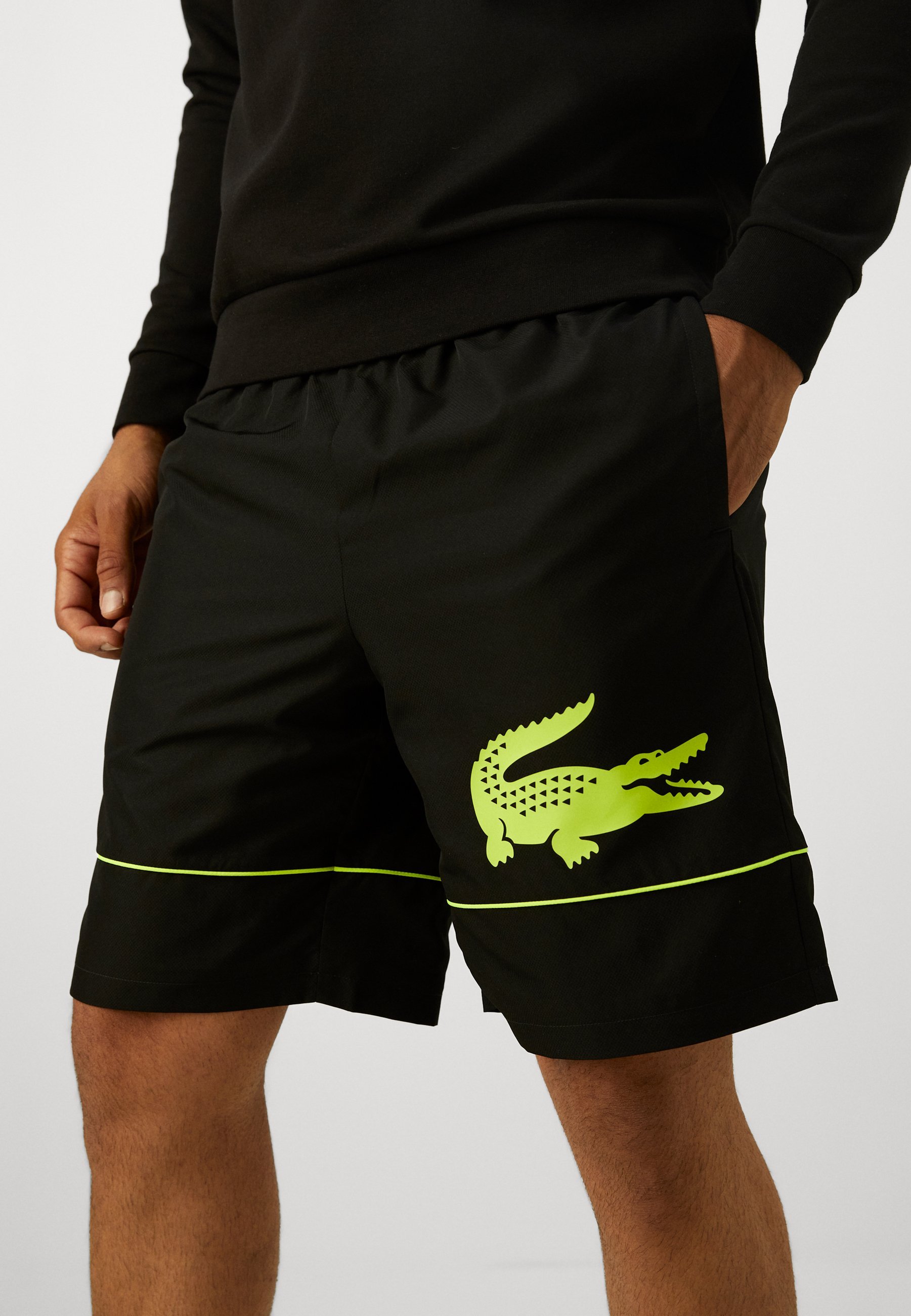 Sportovní kraťasy Lacoste Sport - černá/fluo žlutá