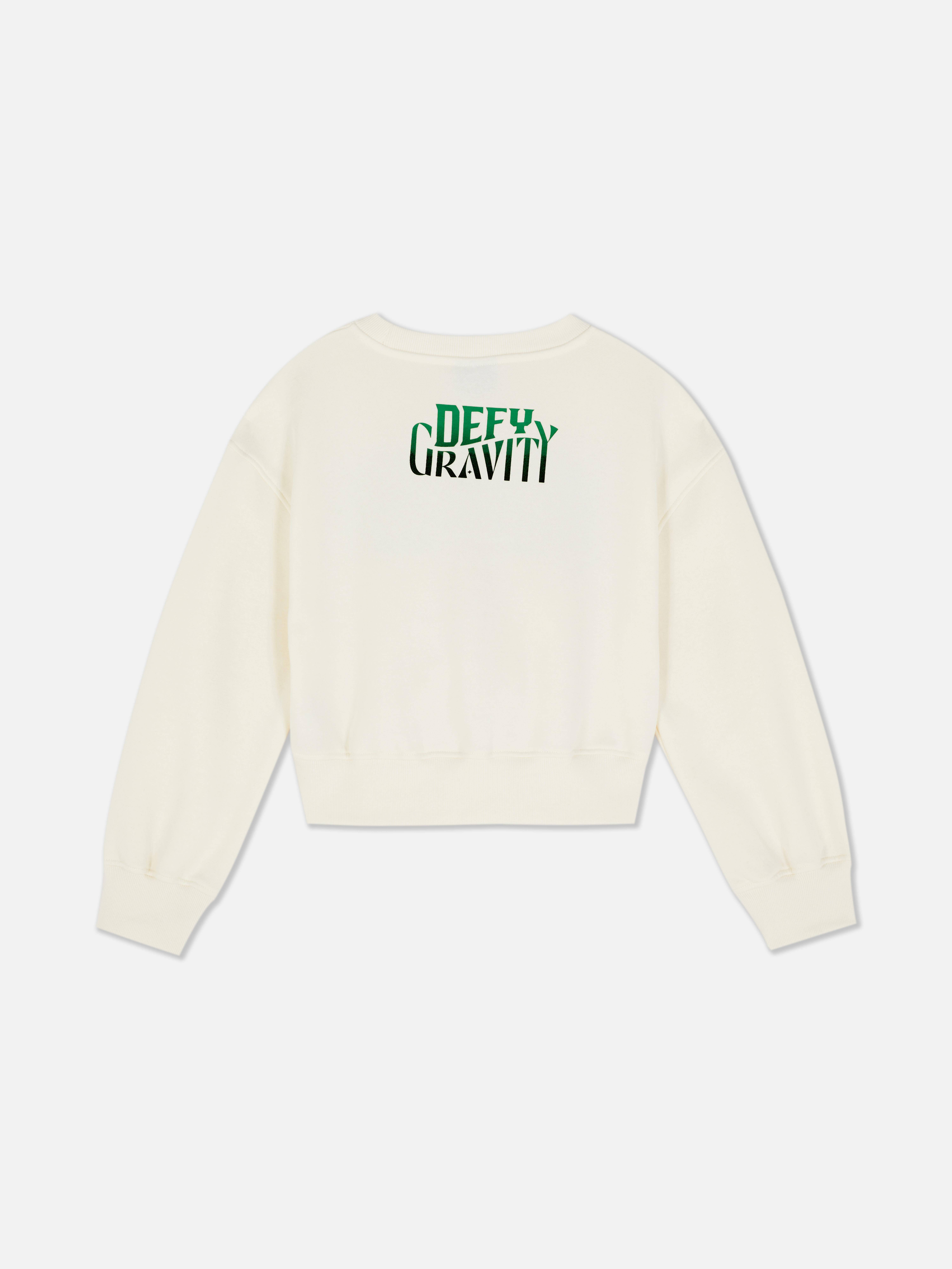 Hanorac Wicked x Primark Defy Gravity Un hanorac scurt cu guler rotund și text Defy Gravity