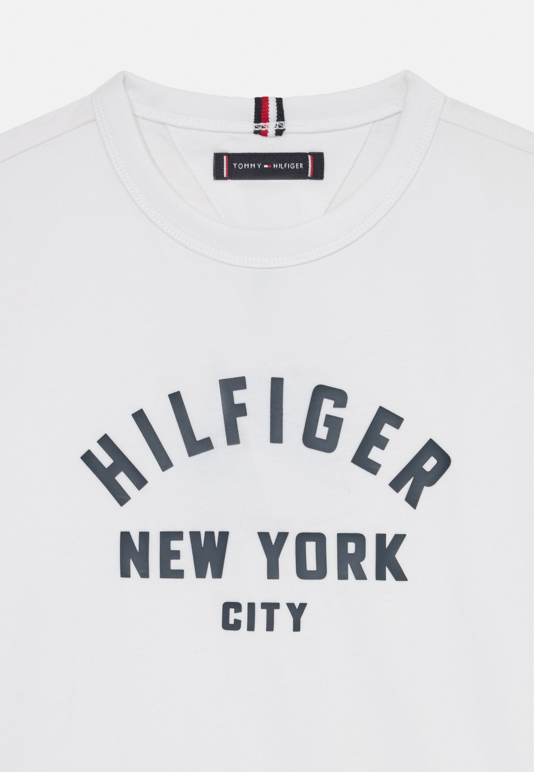 Tommy Hilfiger T-shirt grafica curva unisex - T-shirt stampata - bianca