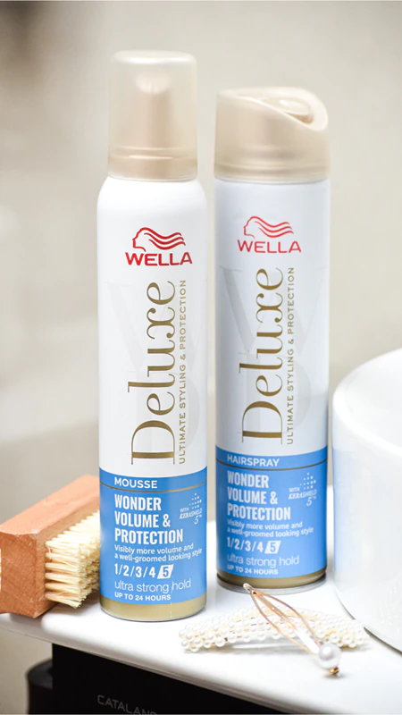 Mousse capilar Wella Deluxe Wonder Volume & Protection para dar volume aos cabelos.
