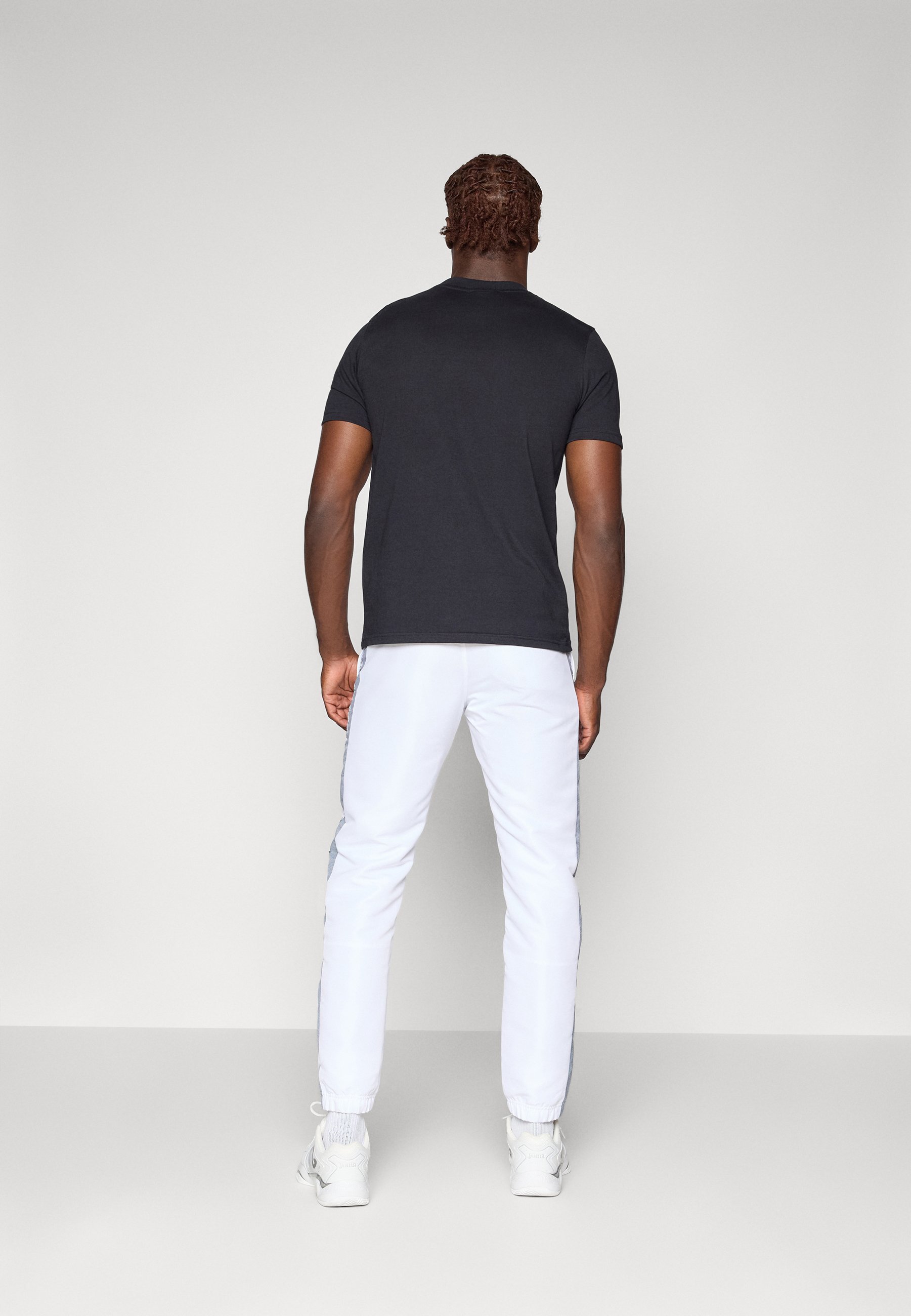 Pantalon Sergio Tacchini MORGANA - Bas de survêtement - blanc/noir