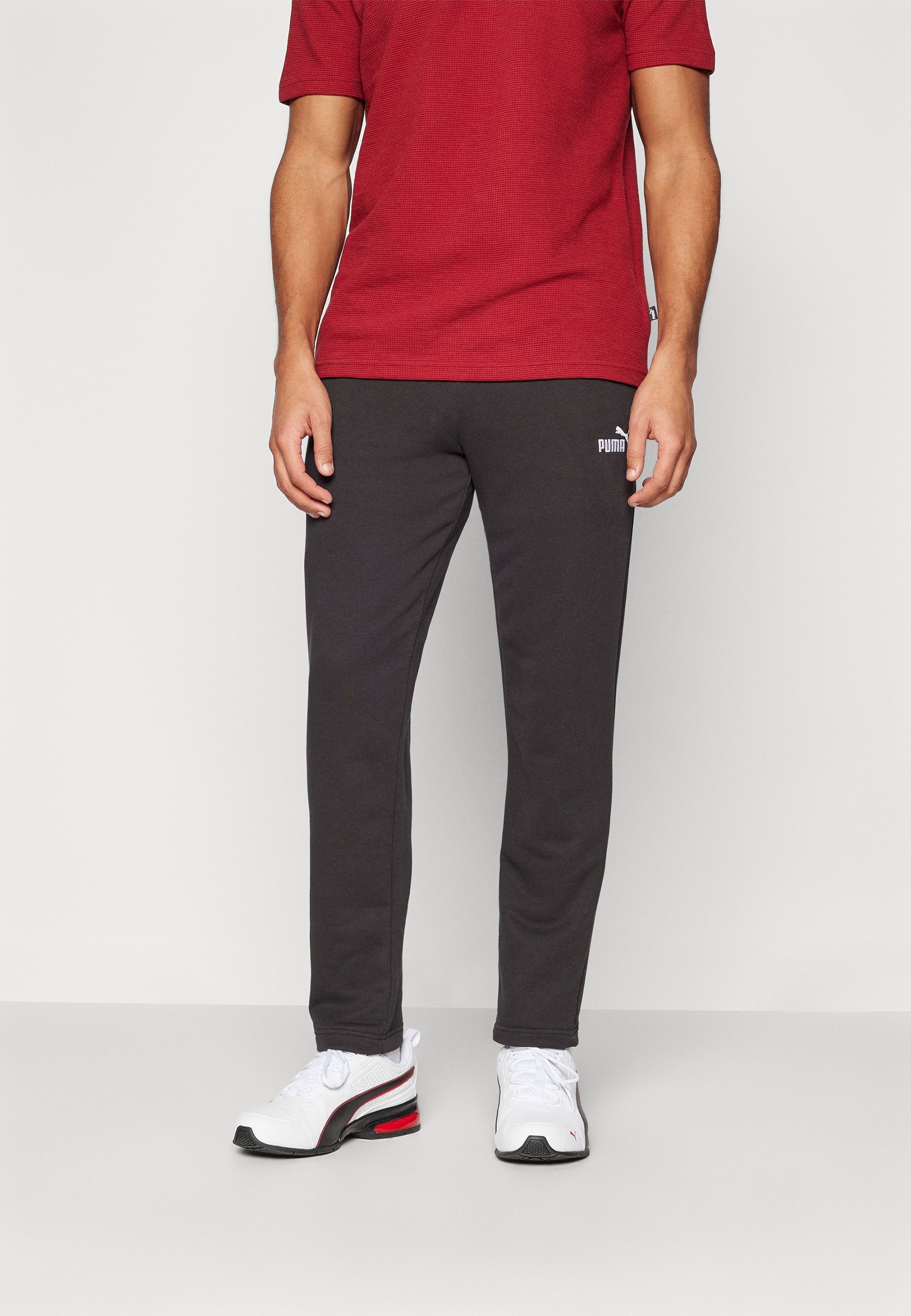 Puma LOGO - Spodnie dresowe - czarne