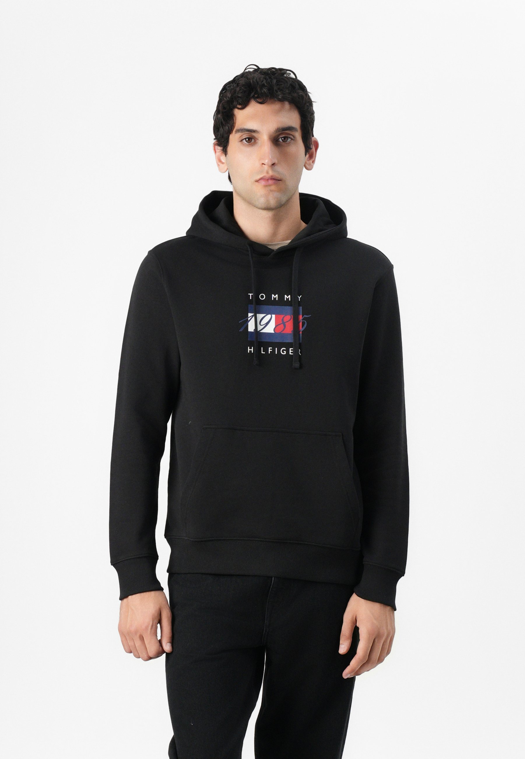 Sweat à capuche unisexe Tommy Hilfiger à motif drapeau linéaire - Noir