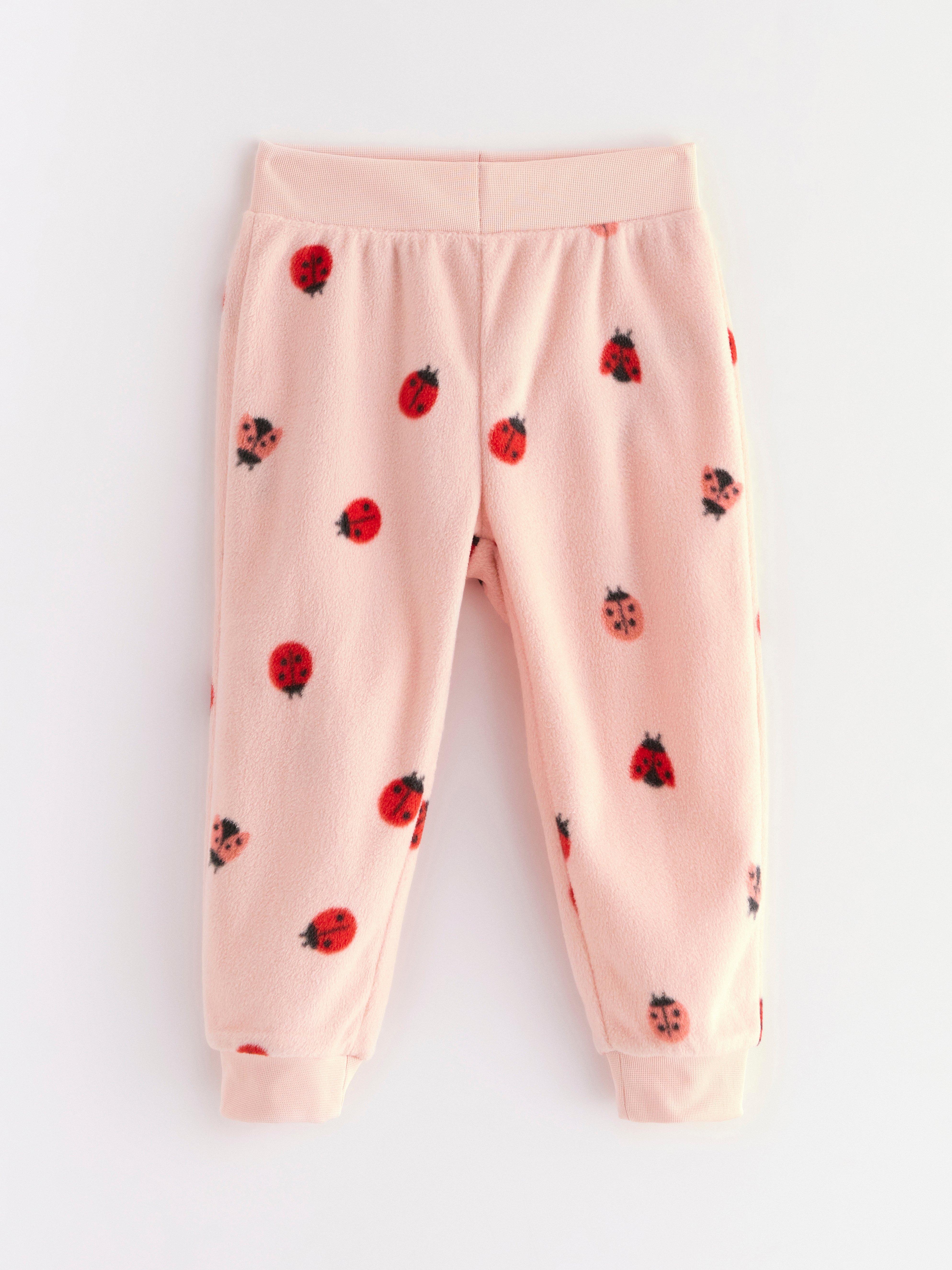 Pantaloni de trening din fleece roz deschis