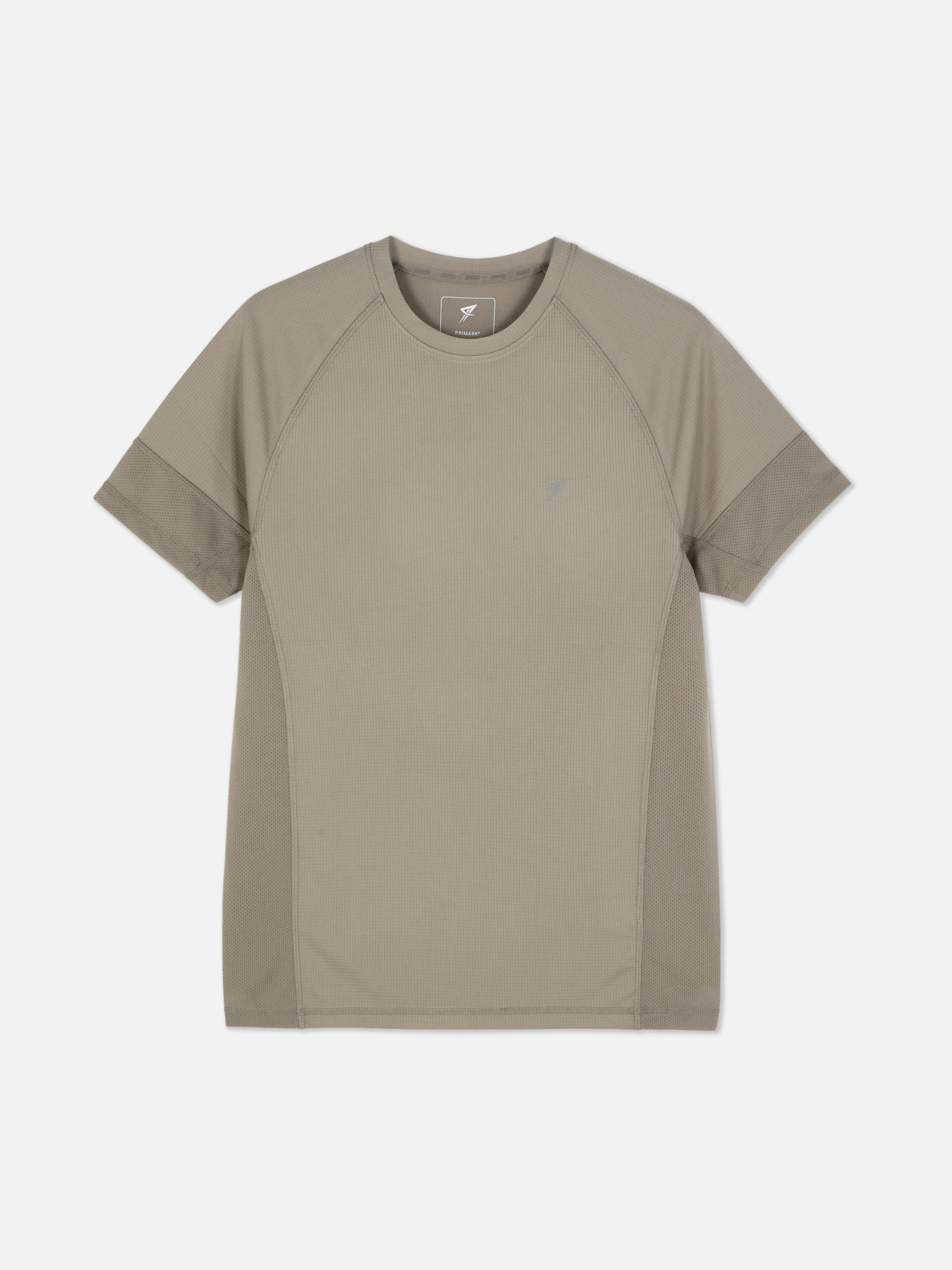 T-shirt de sport à manches courtes. Complétez votre collection de vêtements de sport avec ce t-shirt à col rond, manches courtes et logo réfléchissant.