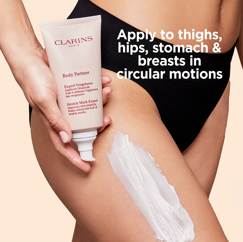 Upokojujúci telový krém Clarins Body Partner Stretch Mark Expert, ktorý redukuje existujúce strie a zabraňuje ich tvorbe.