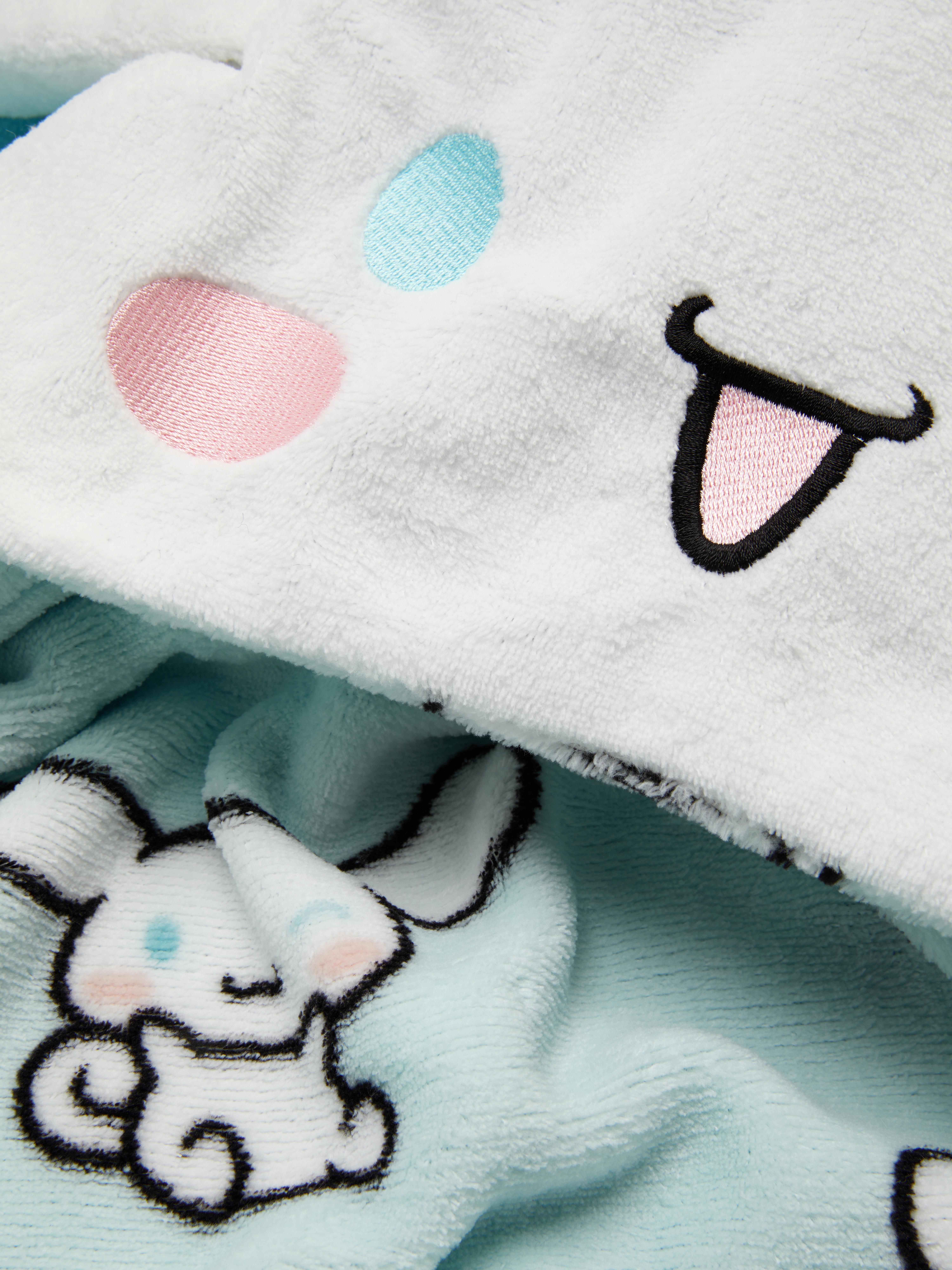 Pătură cu glugă Hello Kitty Cinnamoroll O pătură cu glugă cu un design Cinnamoroll