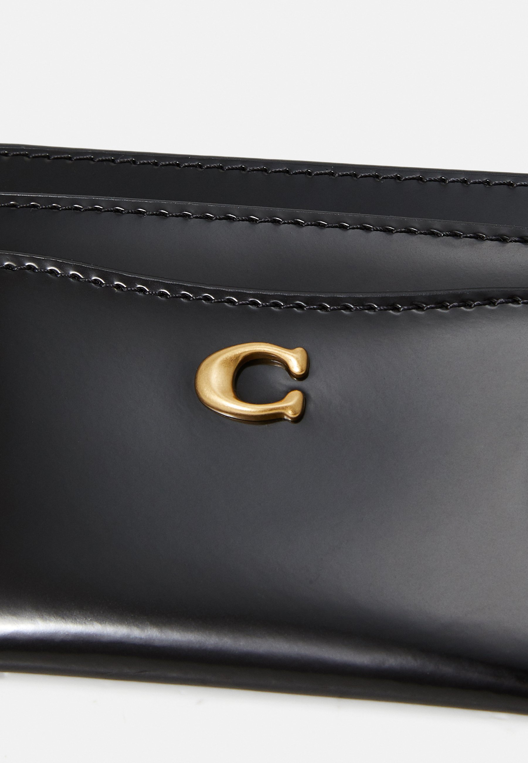 COACH CHARMED SPAZZOLATO - Maku - melns