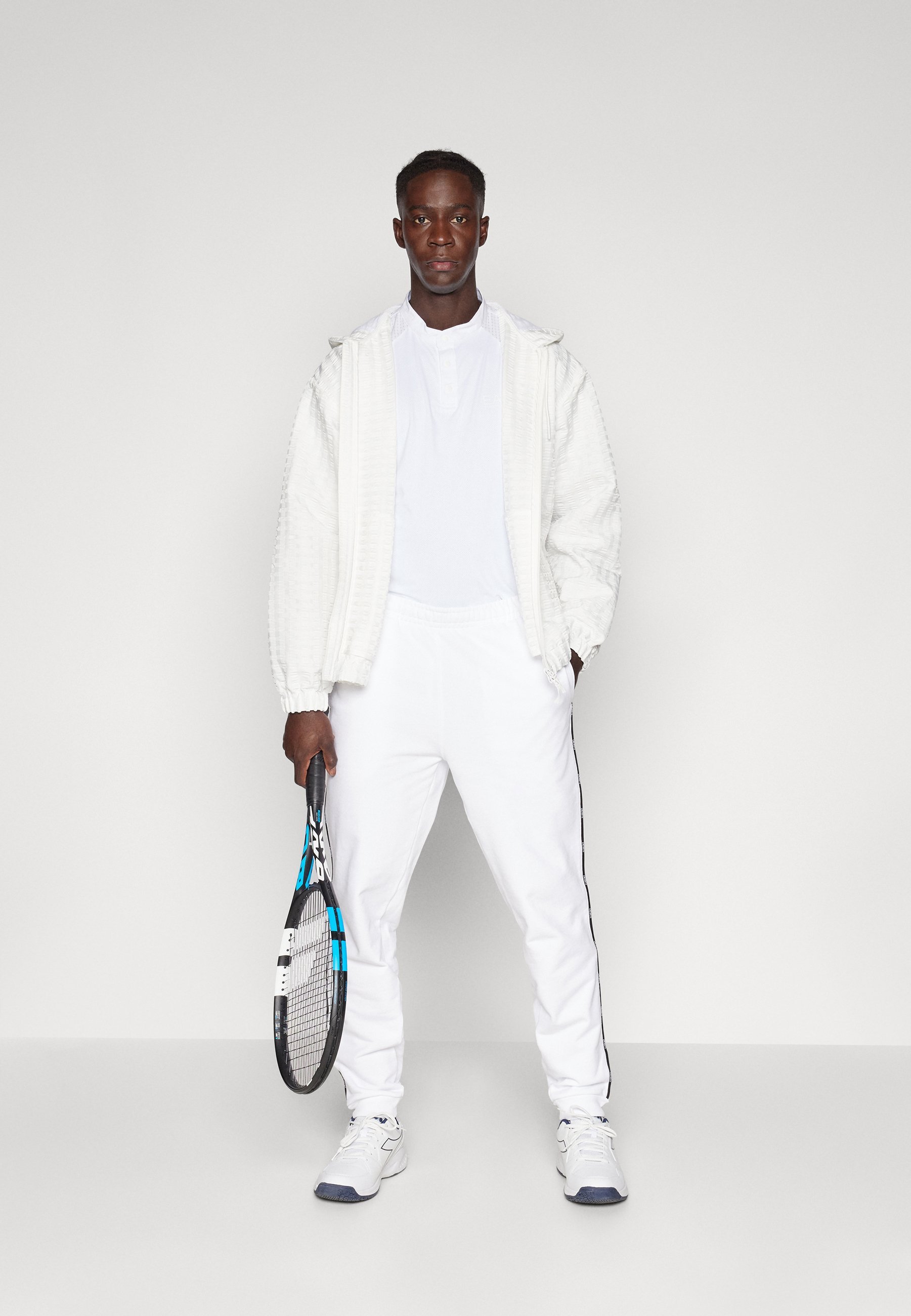 Lacoste Sport PANT TAPE - Teplákové kalhoty - white
