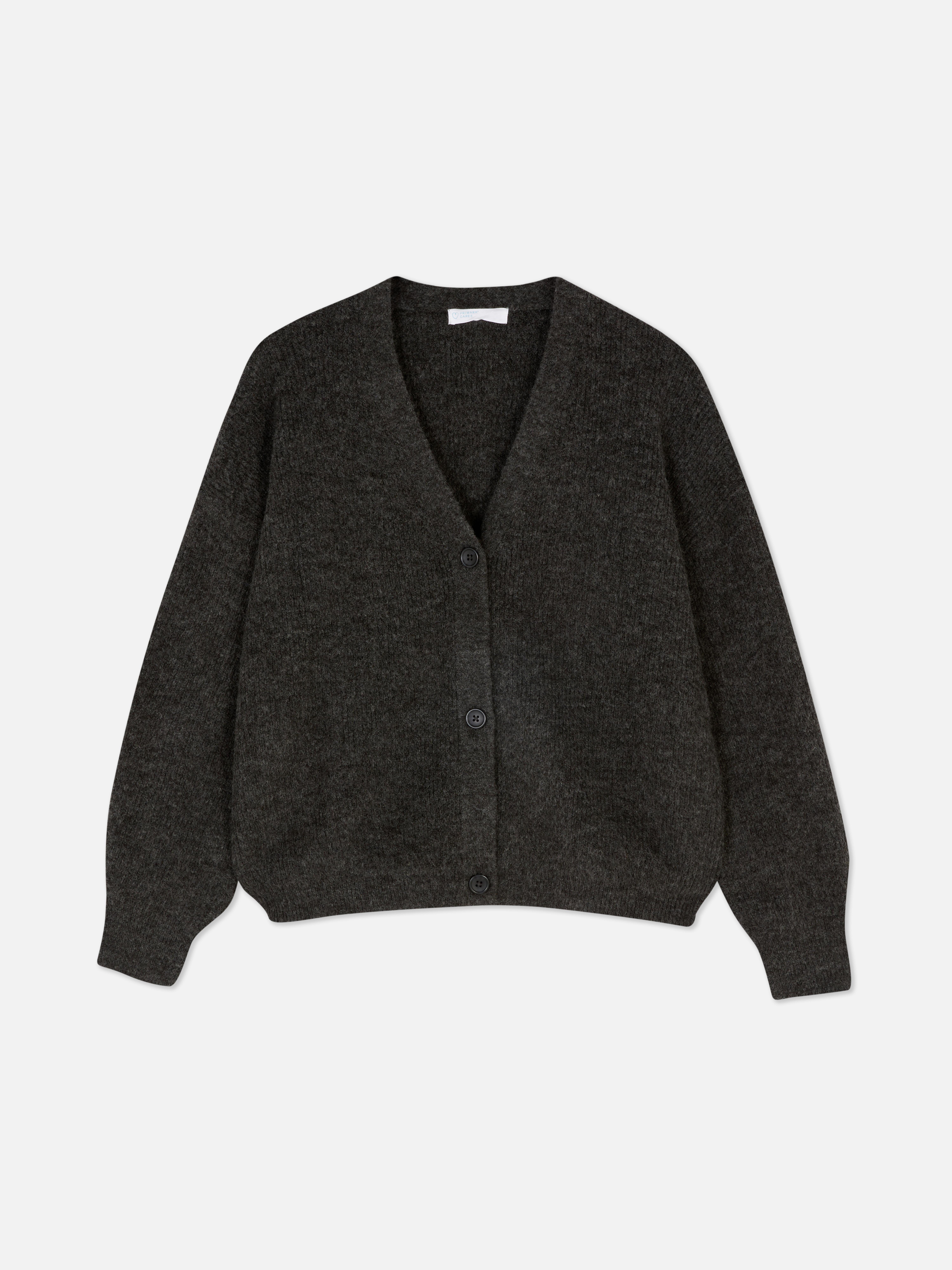 Cardigan con scollo a V e vestibilità comoda. Questo cardigan con bottoni, vestibilità comoda e spalle scese è un classico elegante.