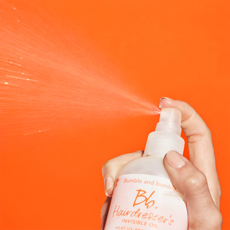 Neviditelný olejový ochranný sprej proti teplu/UV záření pro bezchybný vzhled vlasů od Bumble and Bumble Hairdresser's před stylingem