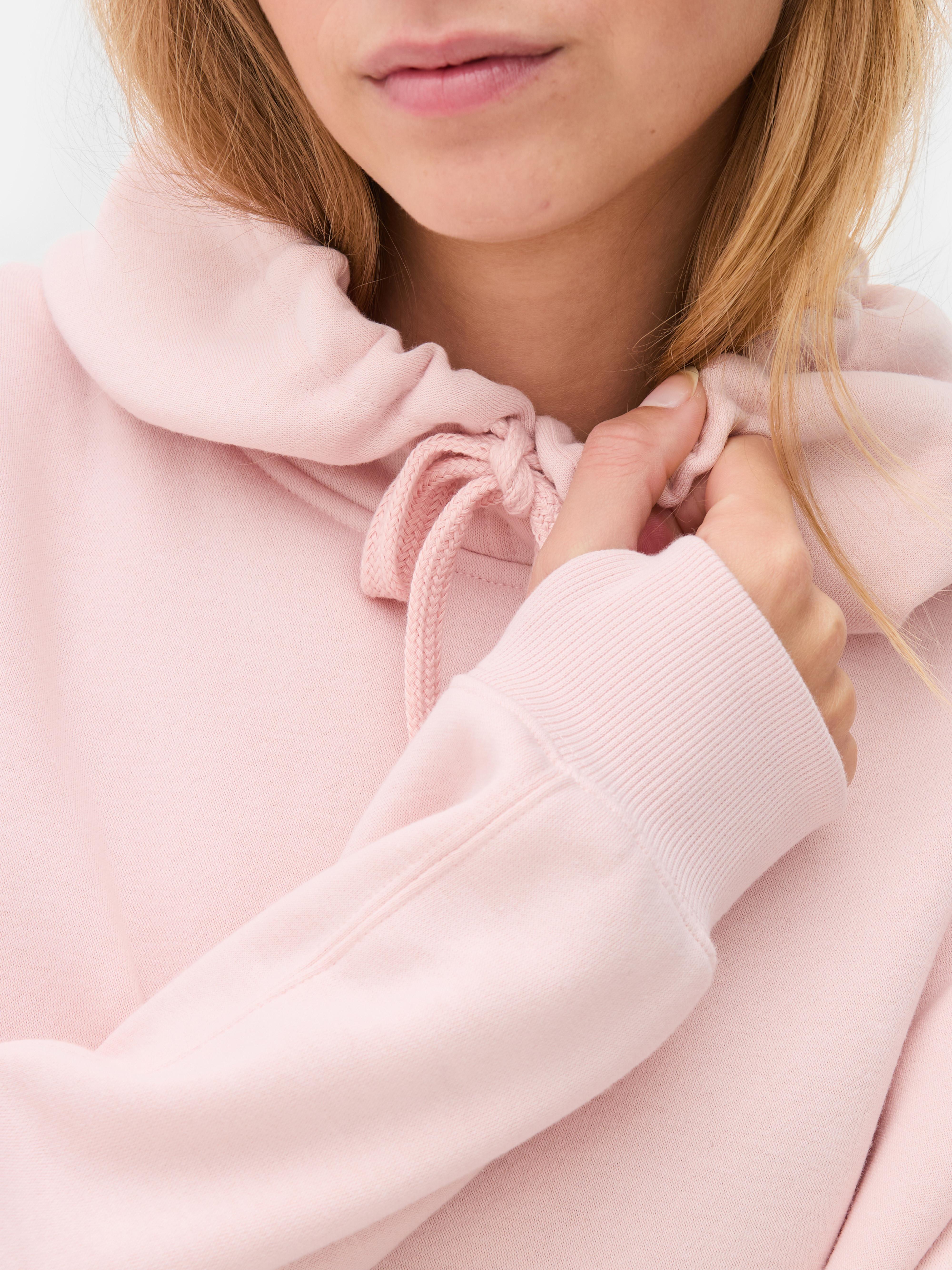 Κλασικό oversized φούτερ με κουκούλα Ένα casual oversized φούτερ με κορδόνι περίσφιξης και τσέπη καγκουρό