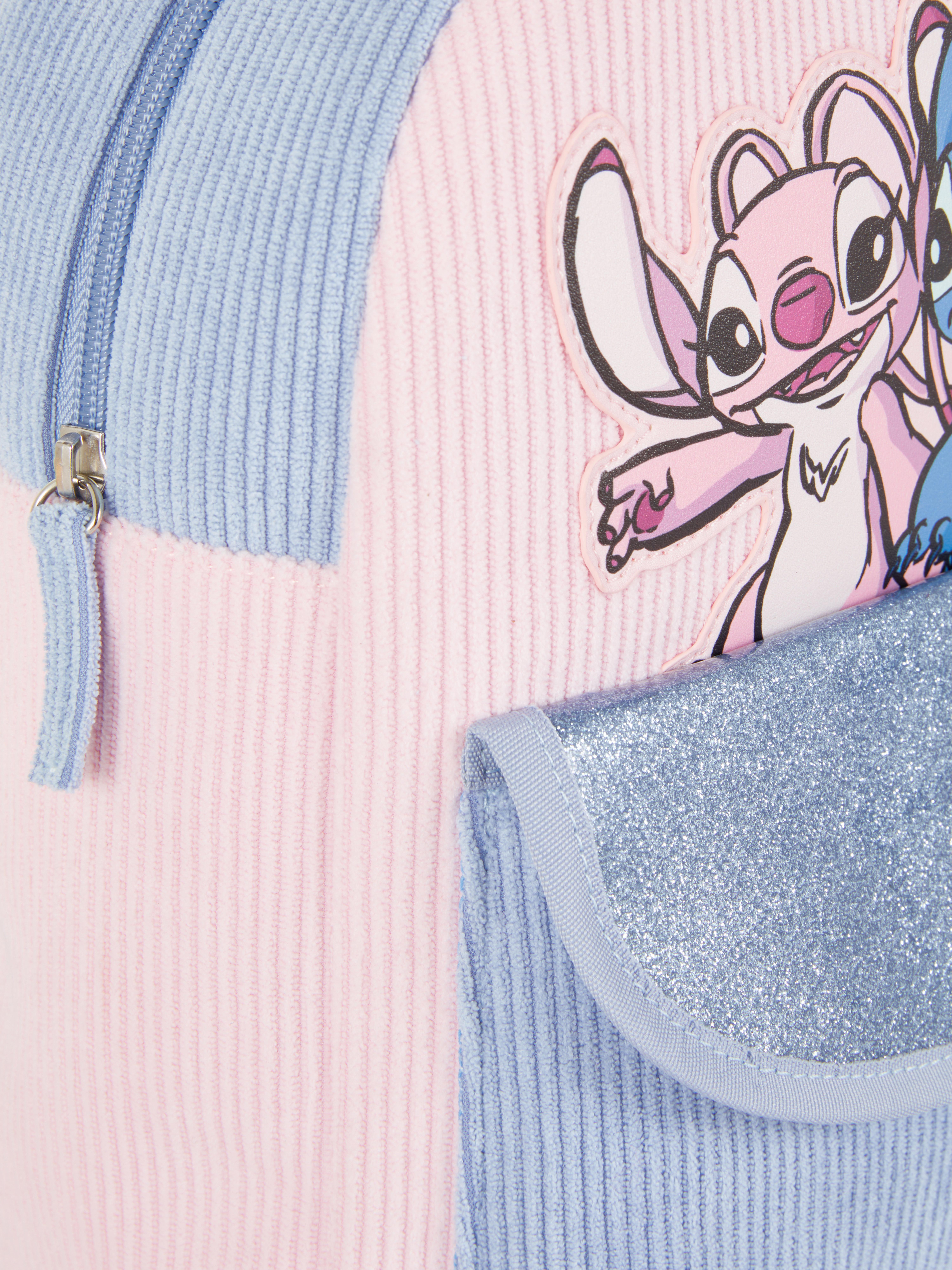 Kordbársony hátizsák Disney Stitch Egy kordbársony Disney hátizsák állítható vállpántokkal és cipzárral