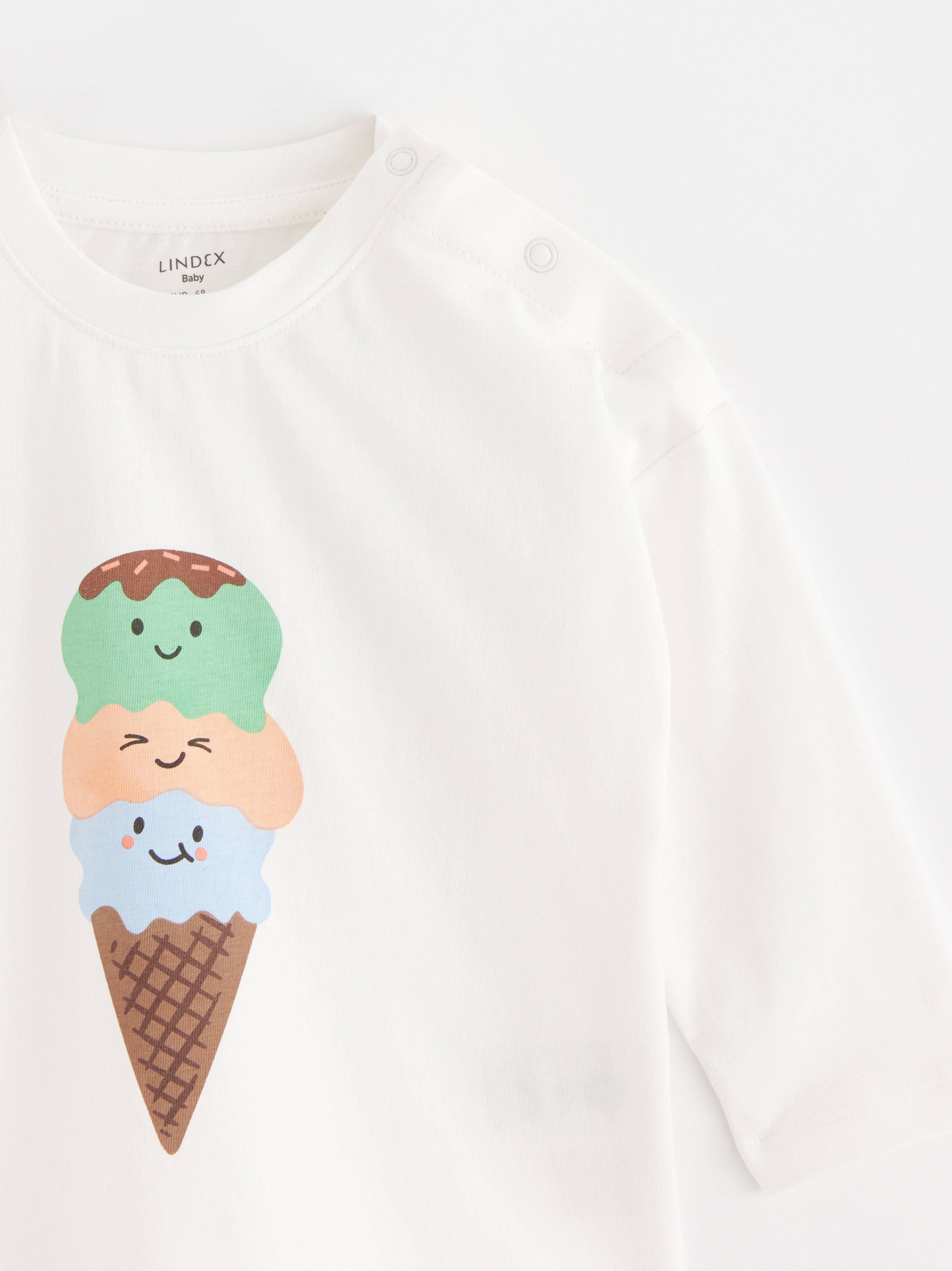 Top de manga larga color blanco claro empolvado