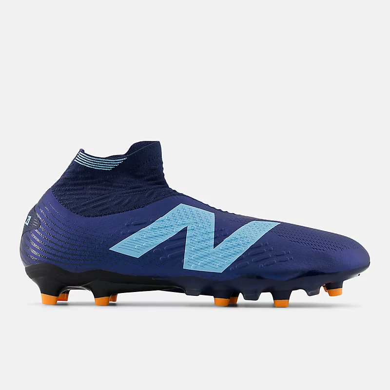 Zapatillas unisex TEKELA PRO FG V4+ - NB Navy z Team Sky Blue i Hot Mango
