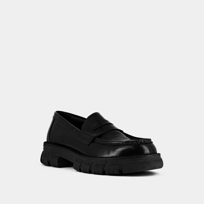 Mocassins à semelles crantées  en cuir glacé noir