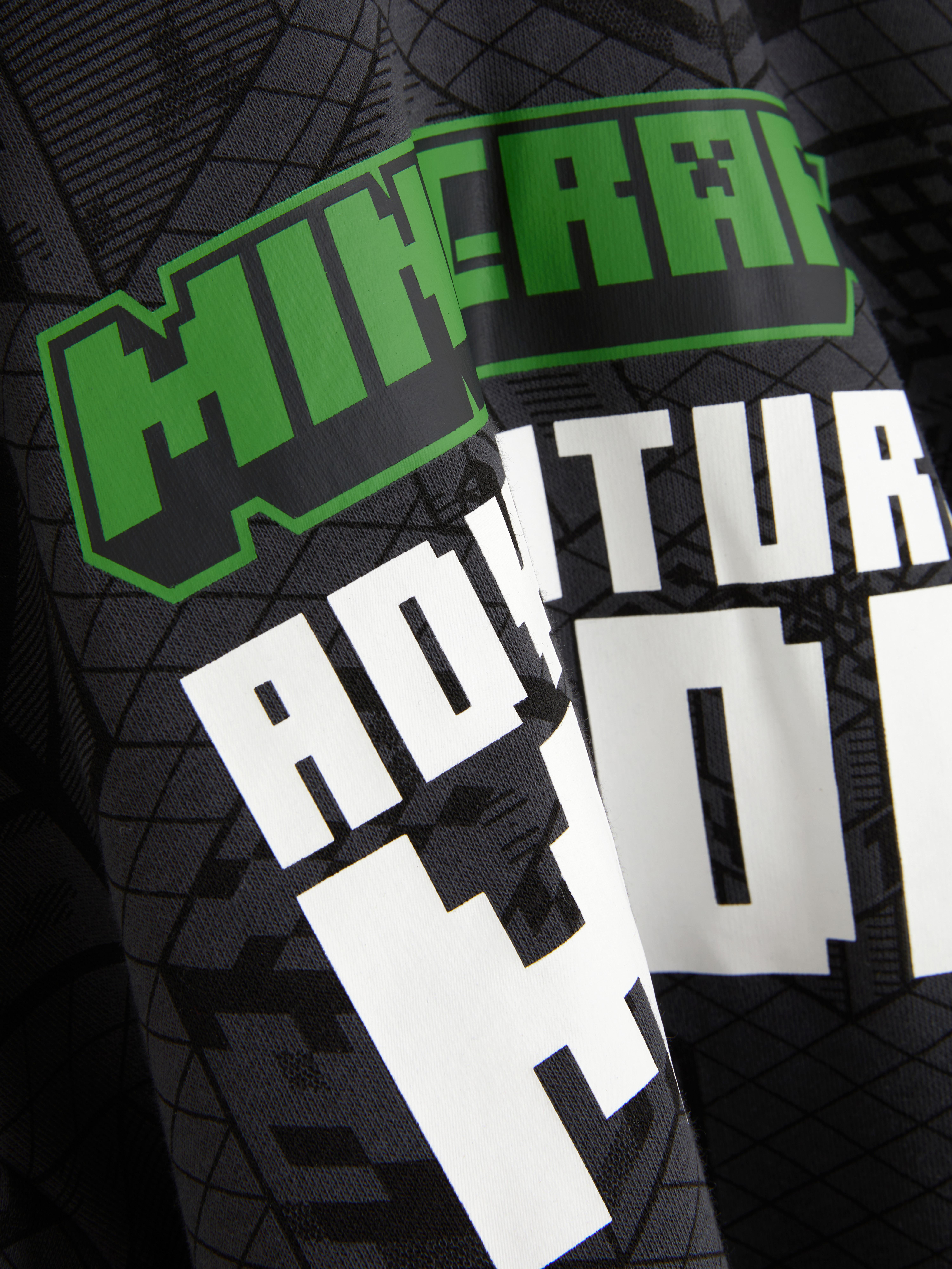 Minecraft-Hoodie mit Print: Ein langärmeliger Hoodie mit Bündchen, Minecraft-Print und geripptem Saum.