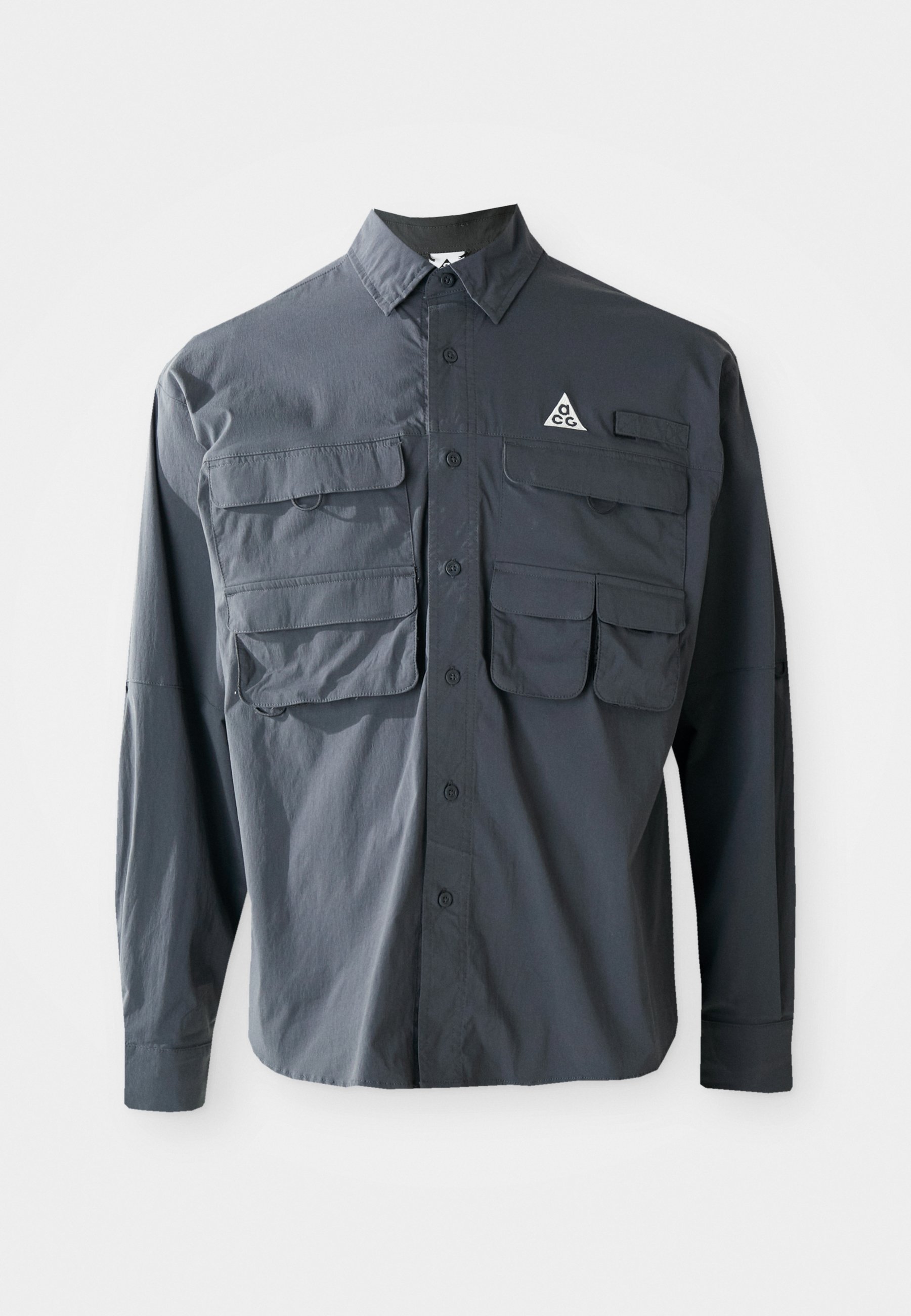 Přechodné bundy Nike ACG