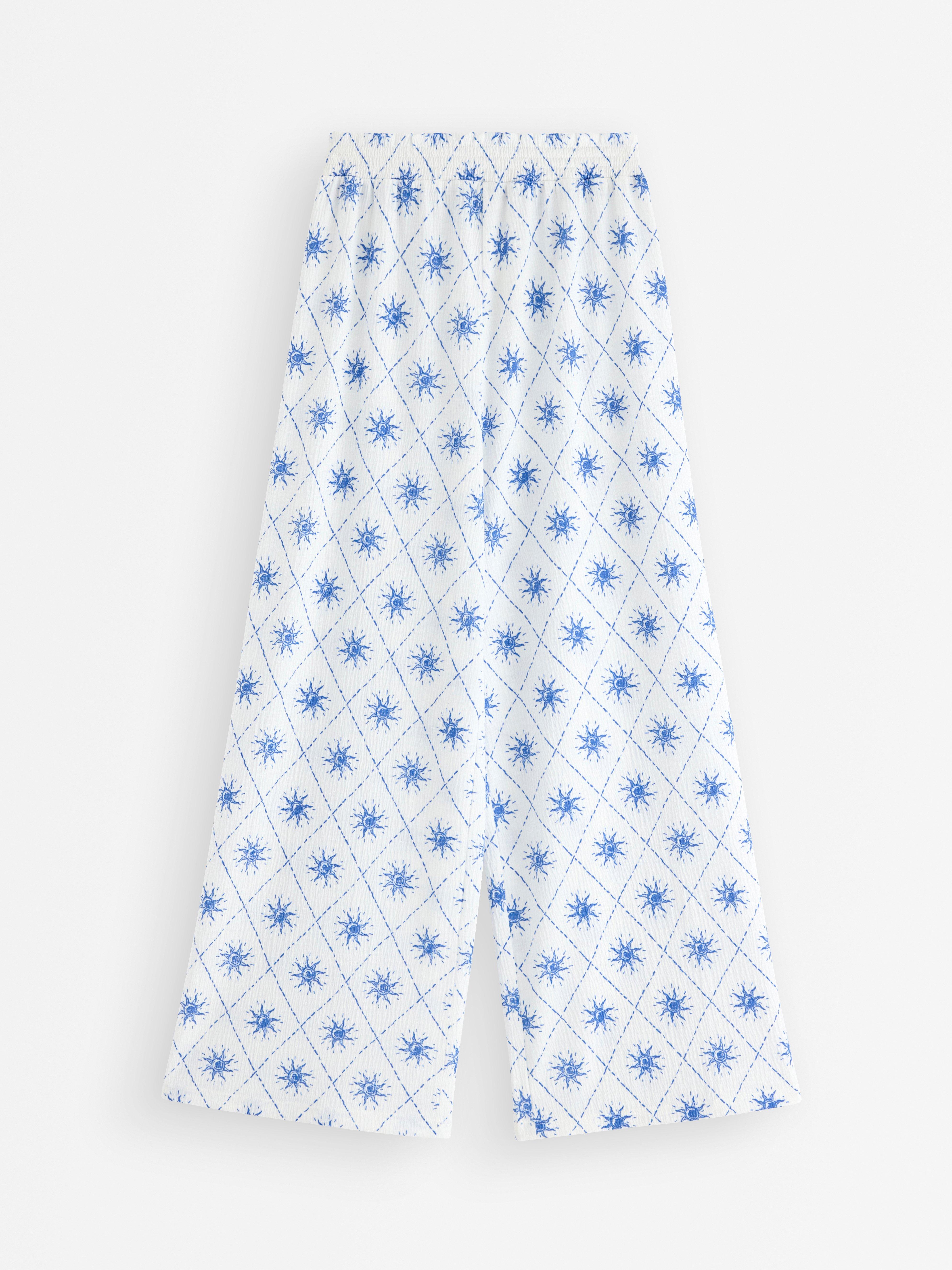 Pantalones de pierna ancha en punto color blanco roto