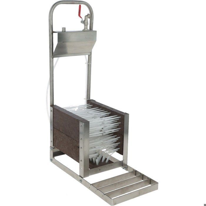 Kit de arandelas para botas desmontado en una caja Kerbl.
