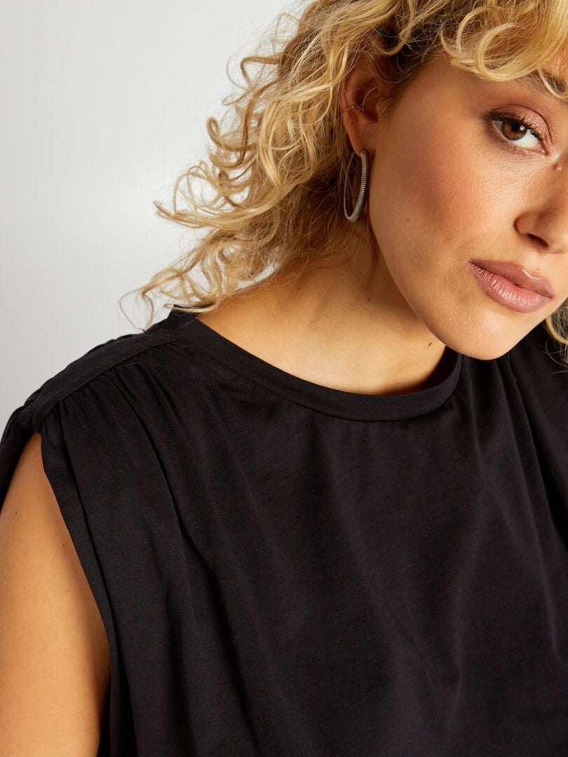 Mouwloos T-shirt met schoudervullingen - zwart