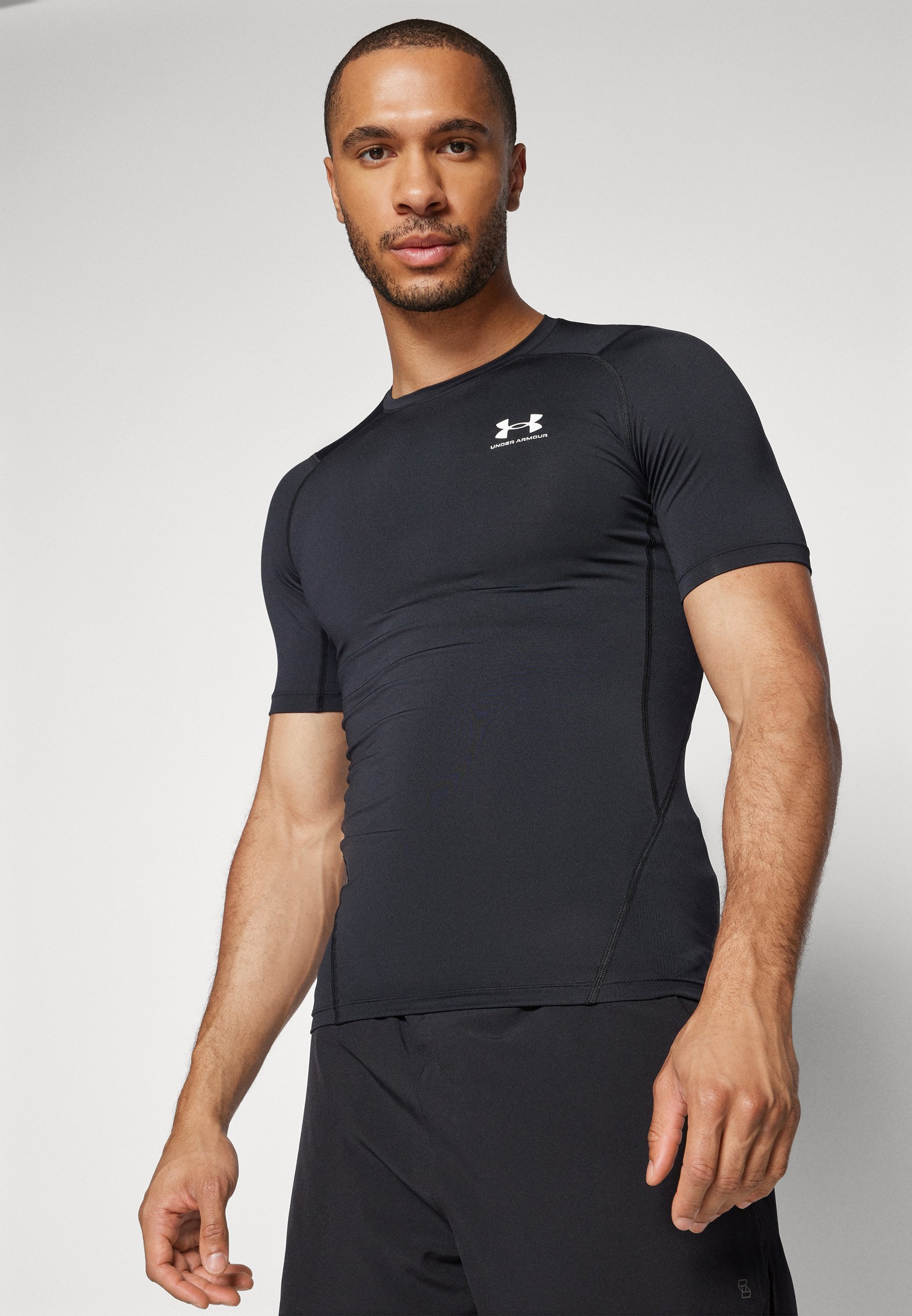 Under Armour HEATGEAR - T-shirt sportiva - nero/bianco