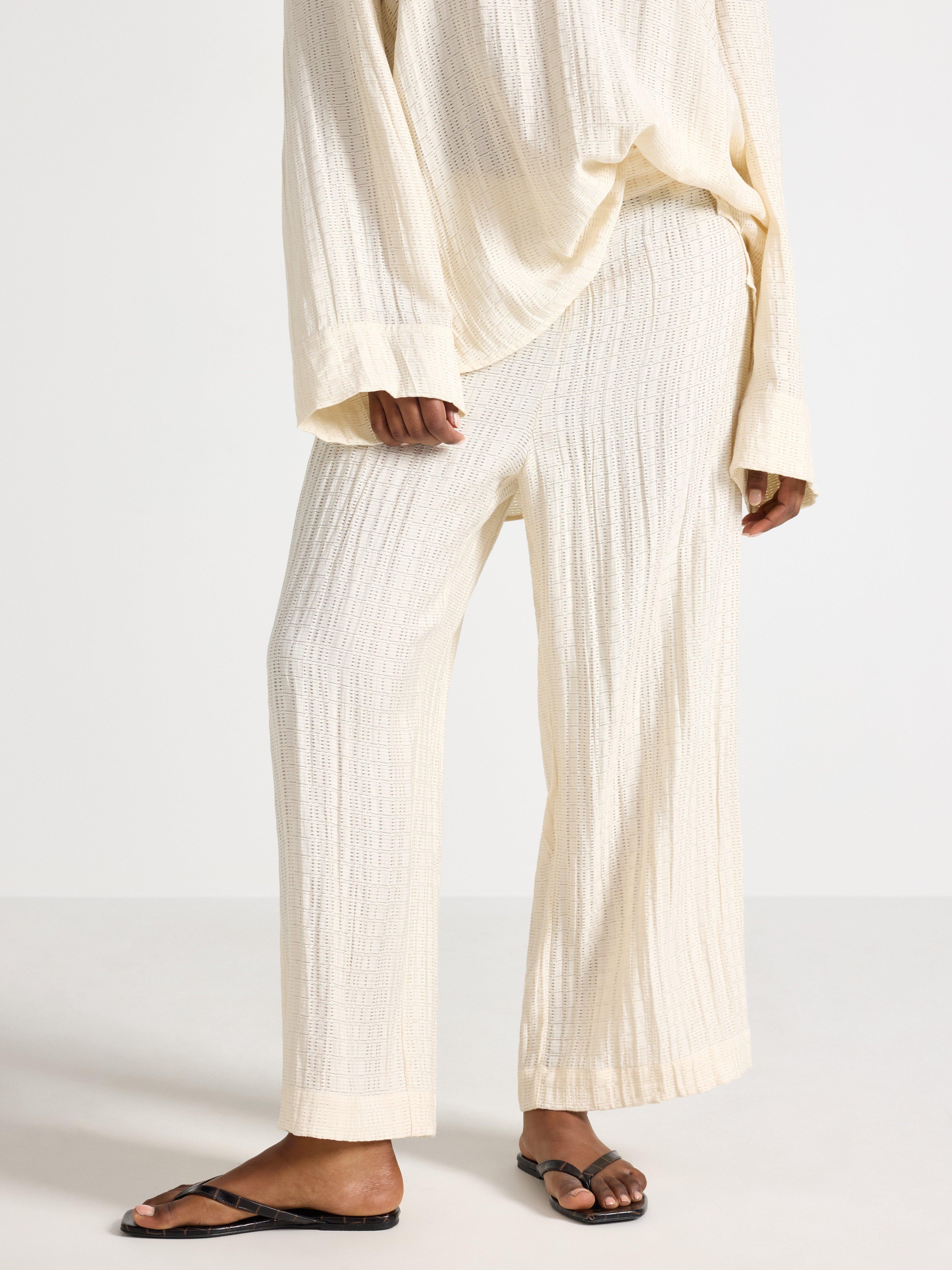 LYKKE Los pantalones anchos Blanco roto