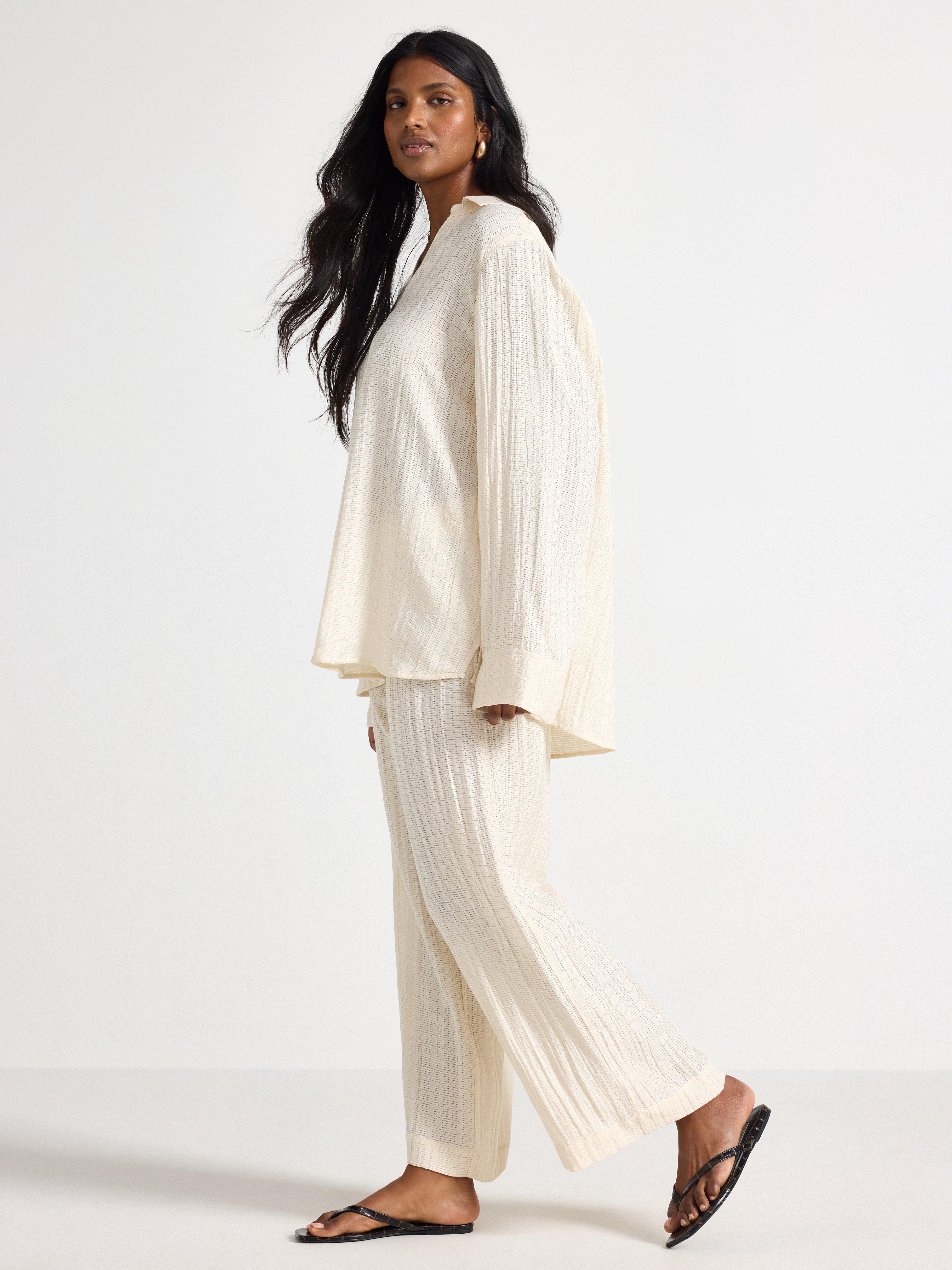 LYKKE Los pantalones anchos Blanco roto