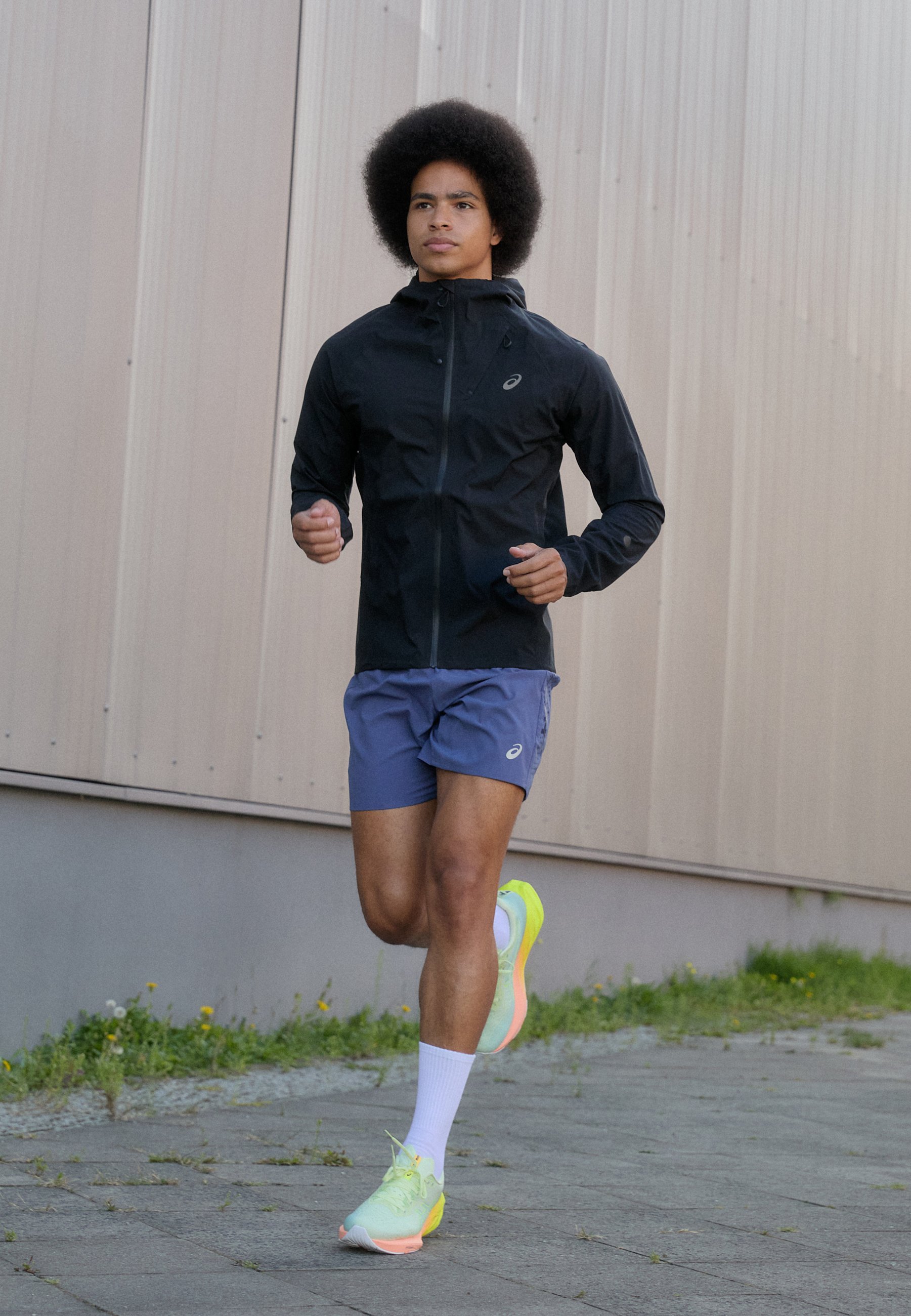 Giacca impermeabile ASICS Metarun - Giacca da corsa - nera ad alte prestazioni