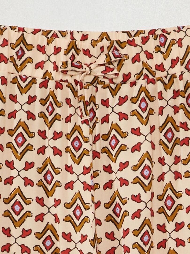 Bedrukte broek met wijde pijpen - BEIGE