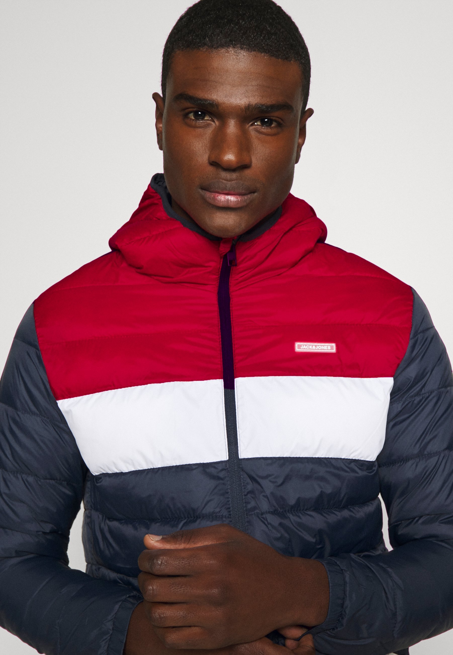 Jack & Jones JJVINCENT PUFFER HOOD - Giacca leggera - rosso tango