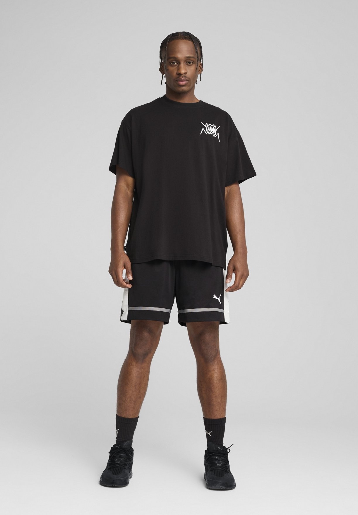 T-shirt de sport Puma JAWS CORE - noir
