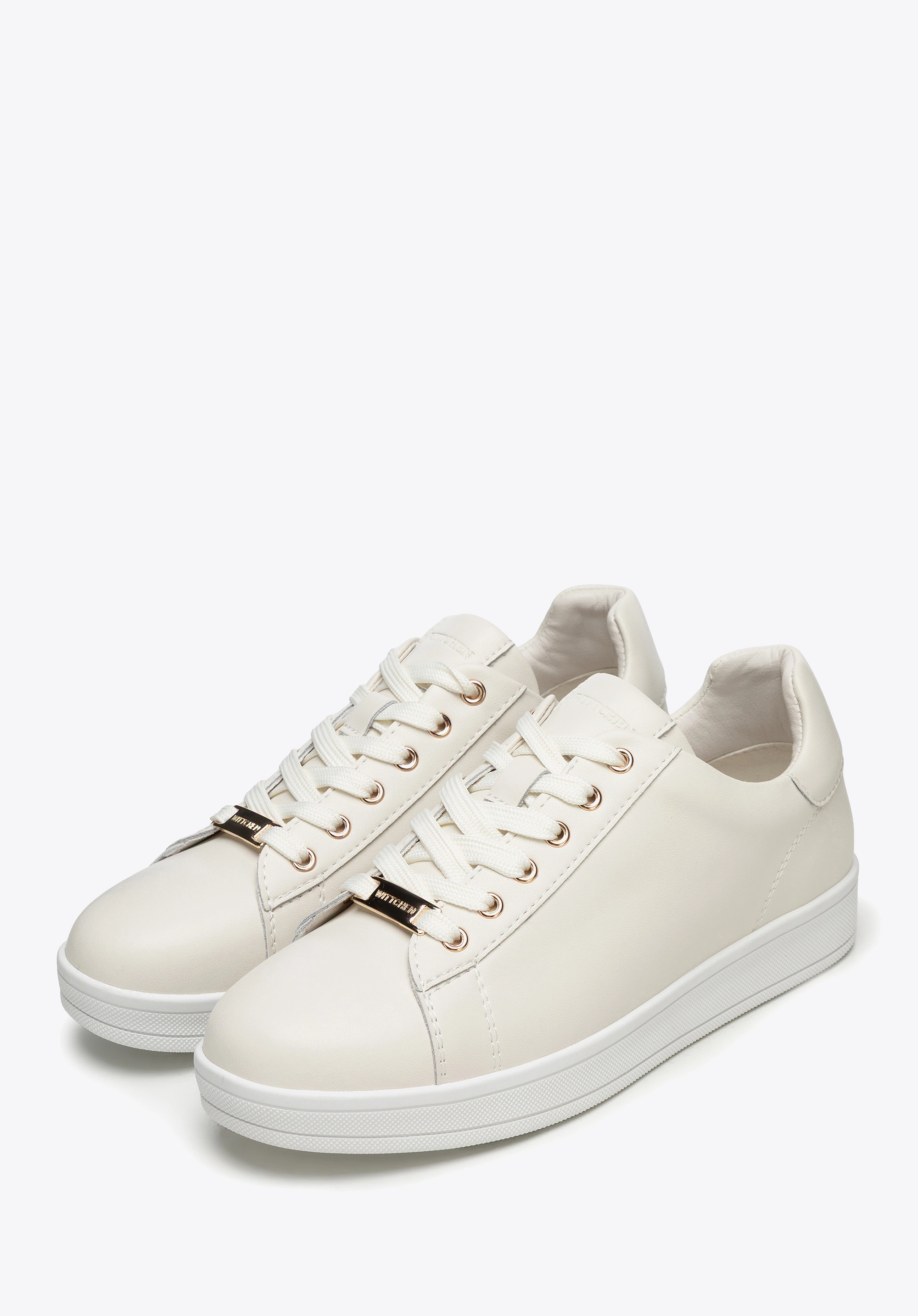 Damskie sneakersy skórzane na platformie kremowe